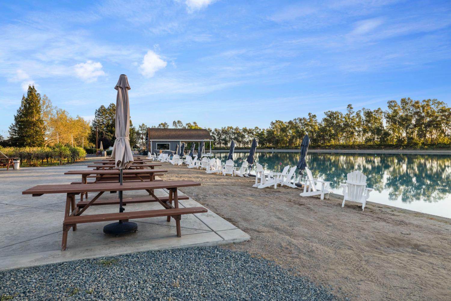 10675 Valensin Road Galt, CA 95632 - Photo 89 of 99 a view of a lake with outdoor seating