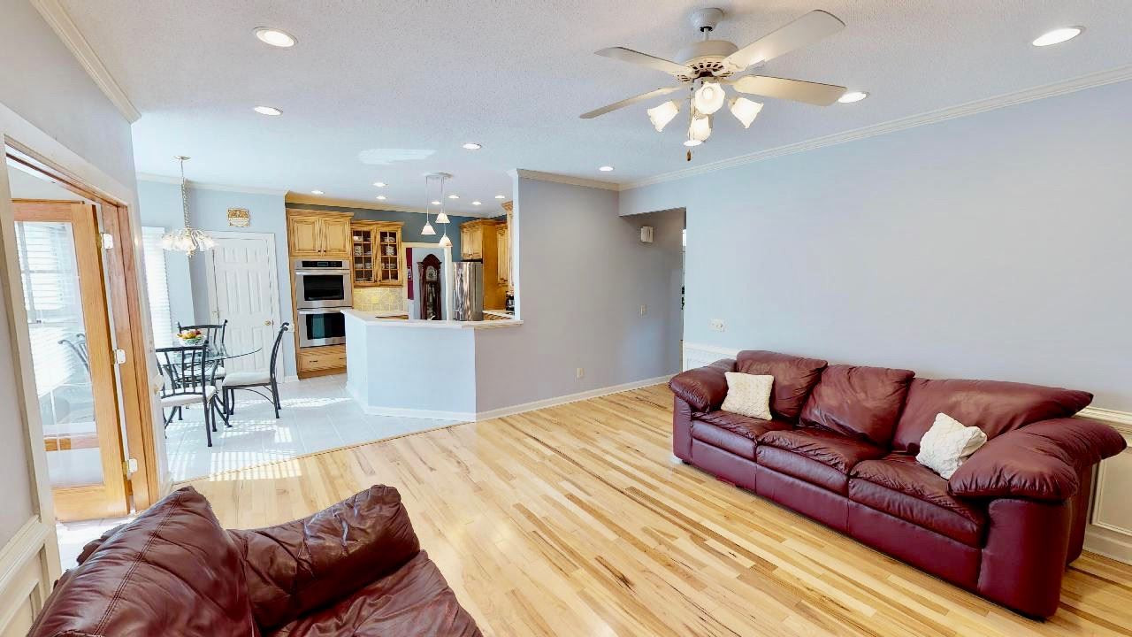 7504 Boscobel Way Raleigh, NC 27615 - Photo 13 of 25 Family room is open to the kitchen / breakfast area as well as the sunroom! Family Room