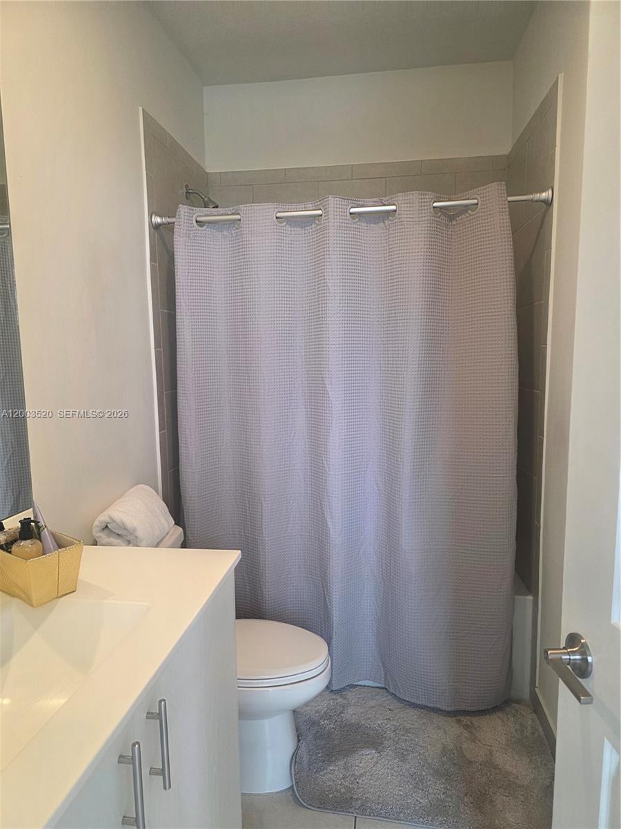 23231 Southwest 129th Path Homestead, FL 33032 - Photo 22 of 33 a bathroom with a sink and toilet