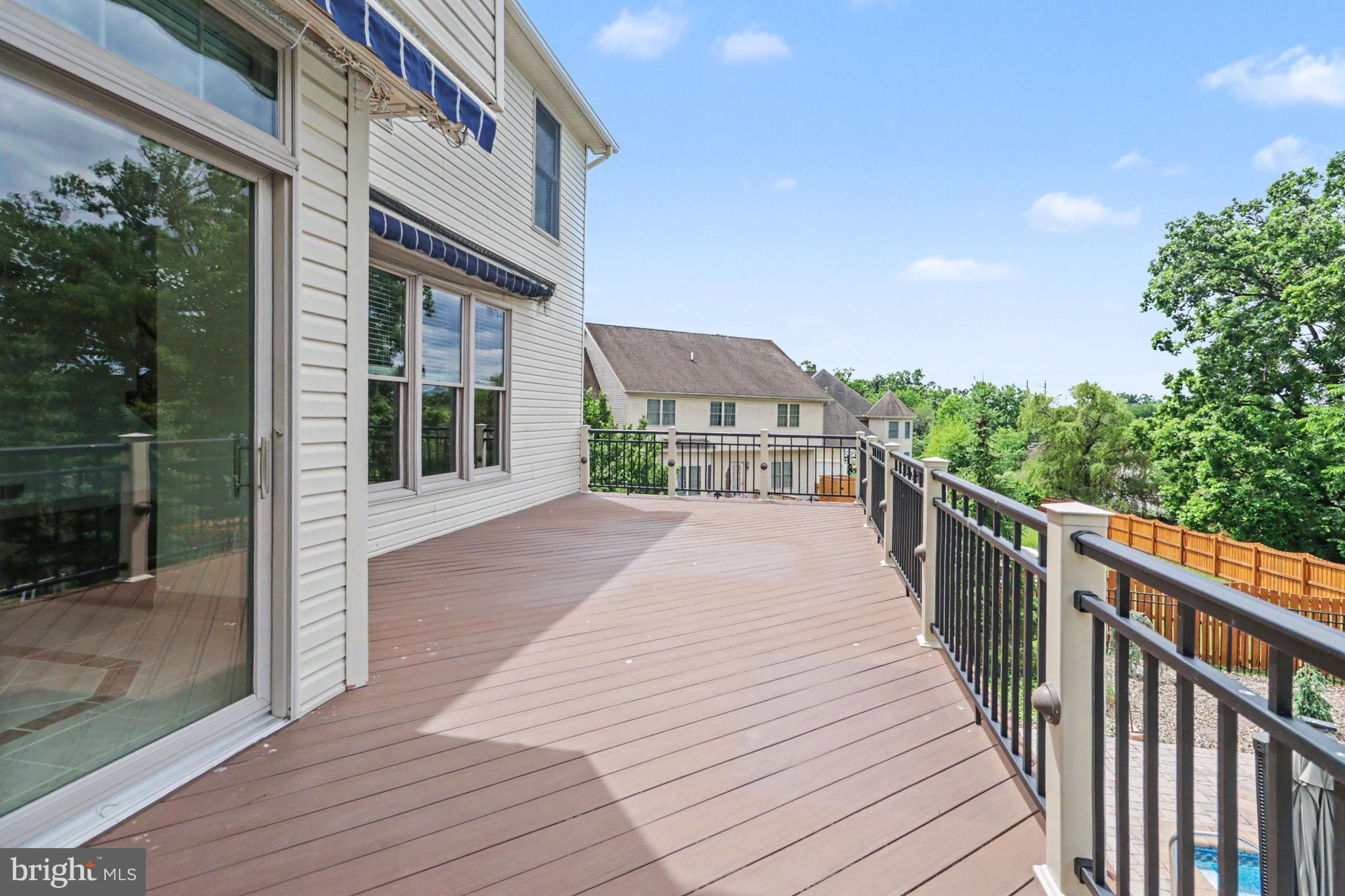 6539 Windmere Road Harrisburg, PA 17111 - Photo 53 of 82 Lagre deck overlooking the fabulous pool area.