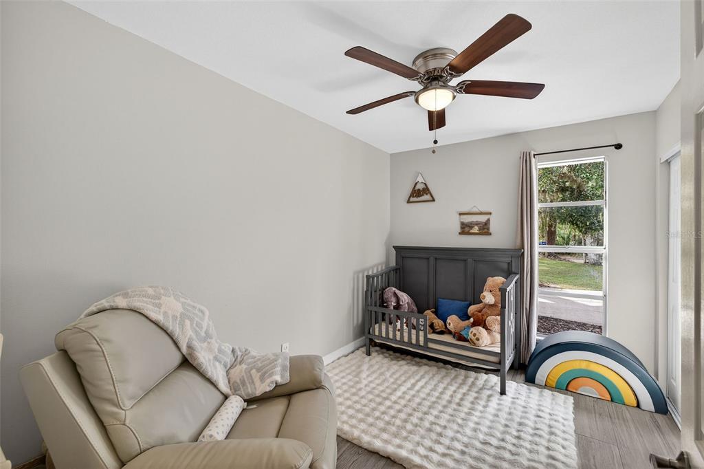 182 Parsons Road Longwood, FL 32779 - Photo 16 of 54 a living room with a couch