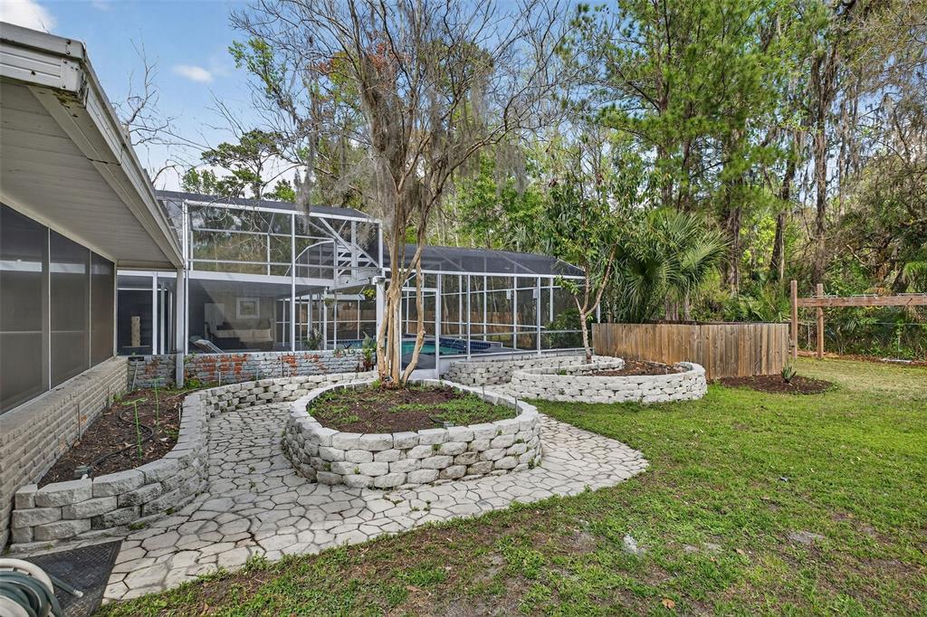 182 Parsons Road Longwood, FL 32779 - Photo 29 of 54 a view of a house with backyard and sitting area