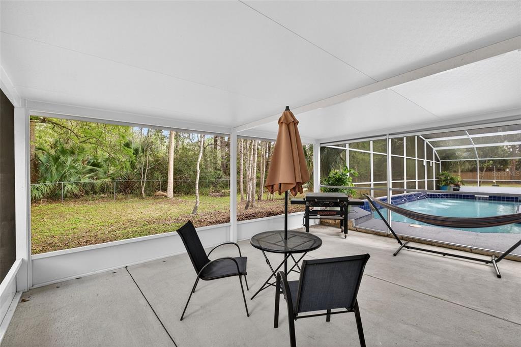 182 Parsons Road Longwood, FL 32779 - Photo 35 of 54 a living room with furniture and a large window