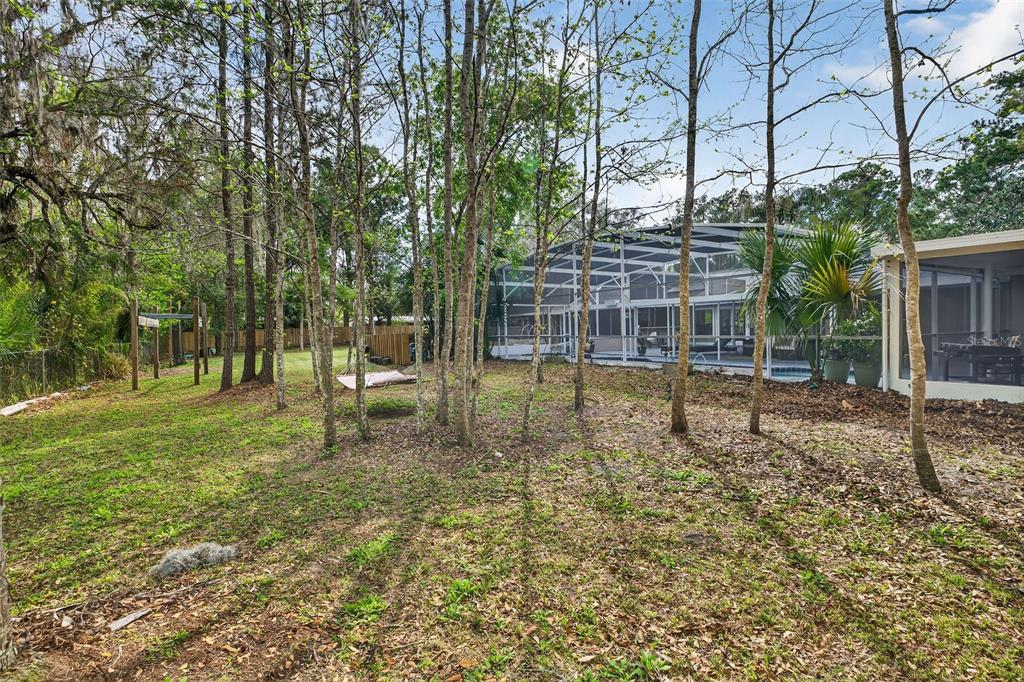 182 Parsons Road Longwood, FL 32779 - Photo 36 of 54 a house view with a garden space