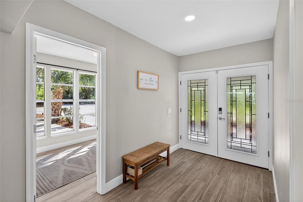 182 Parsons Road Longwood, FL 32779 - Photo 39 of 54 a view of room with window and wooden floor
