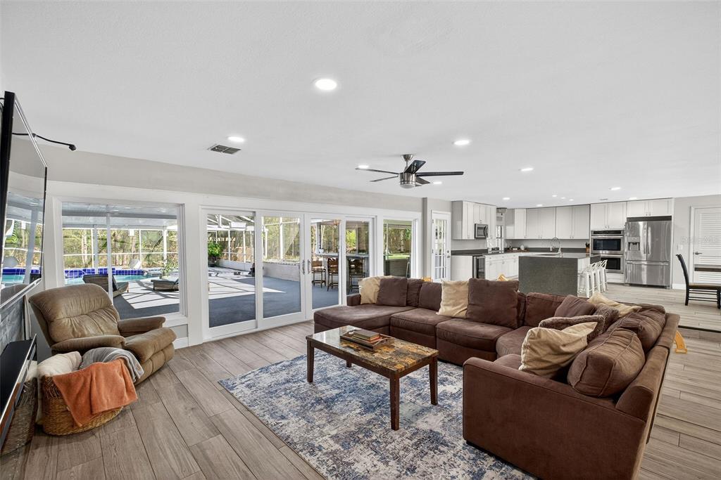 182 Parsons Road Longwood, FL 32779 - Photo 42 of 54 a living room with furniture and a large window