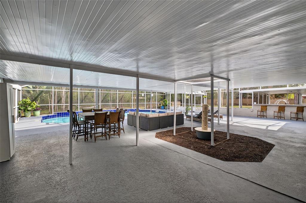 182 Parsons Road Longwood, FL 32779 - Photo 51 of 54 a outdoor space with lots of tables and chairs