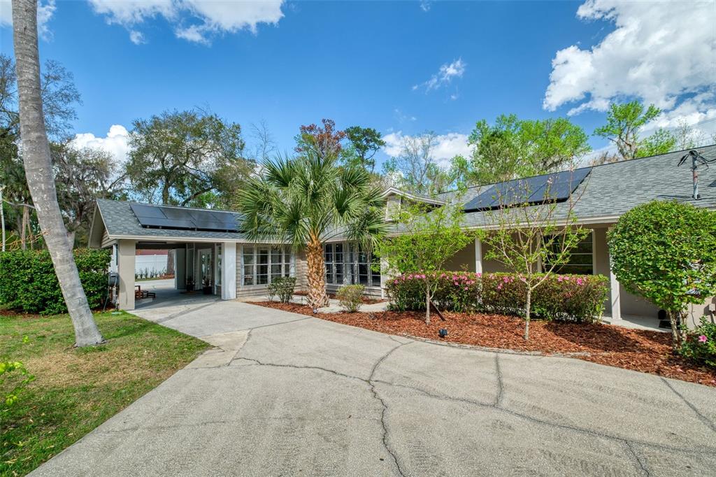 182 Parsons Road Longwood, FL 32779 - Photo 53 of 54 a view of a house with backyard and sitting area