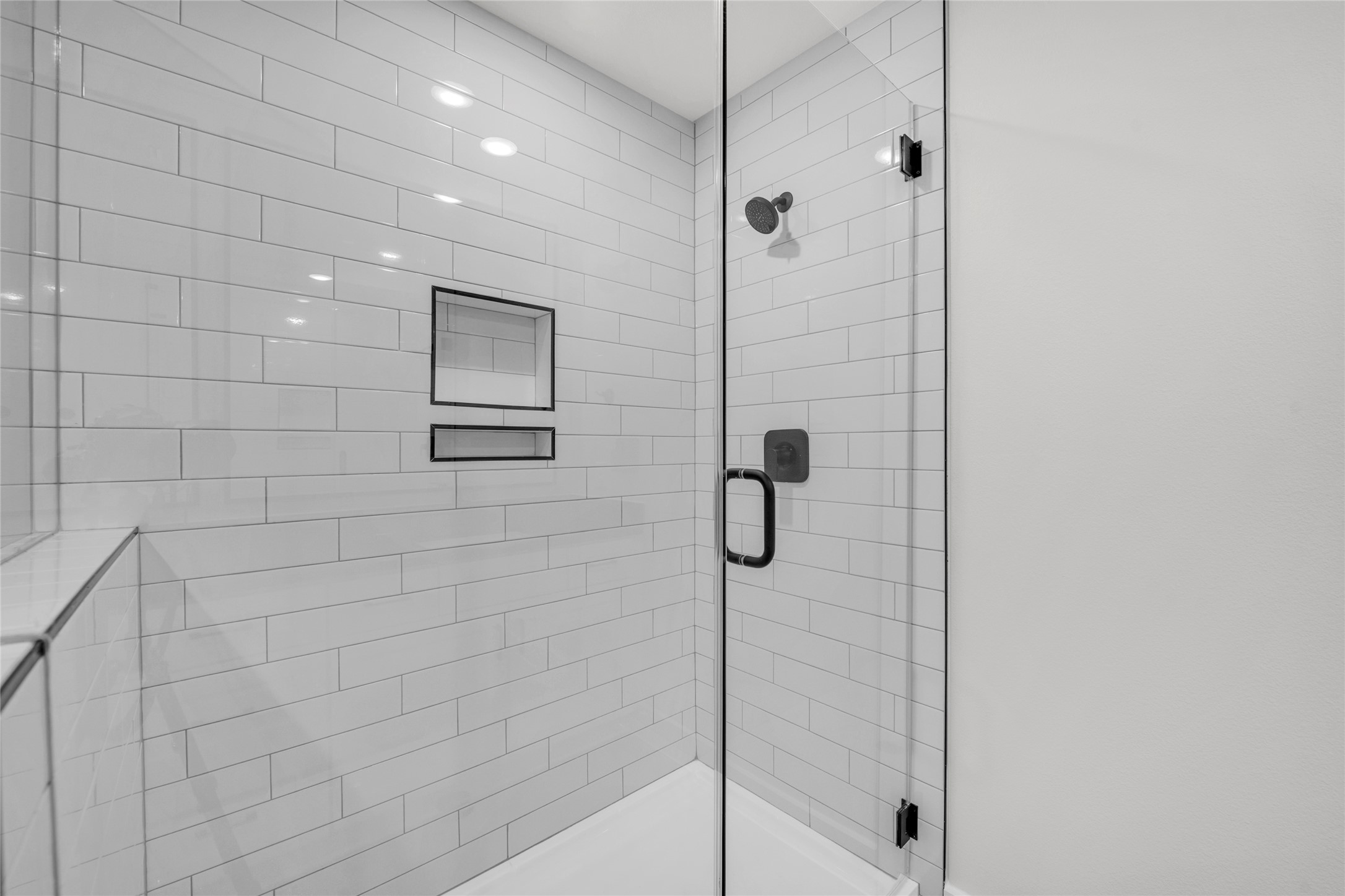 9317 Curious Squirrel Street Austin, TX 78744 - Photo 12 of 26 Full bathroom featuring a shower stall