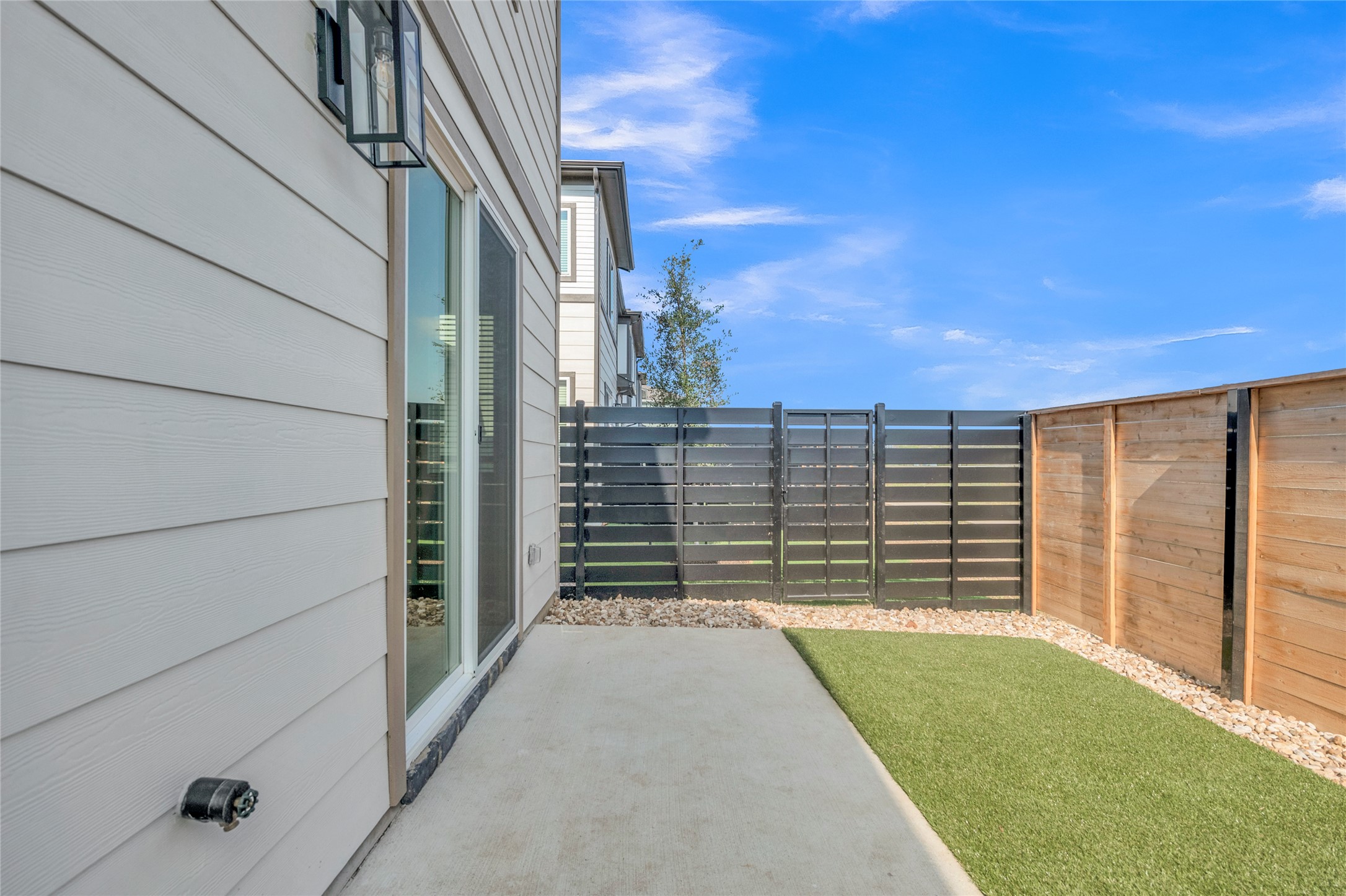 9317 Curious Squirrel Street Austin, TX 78744 - Photo 5 of 26 View of yard with a patio