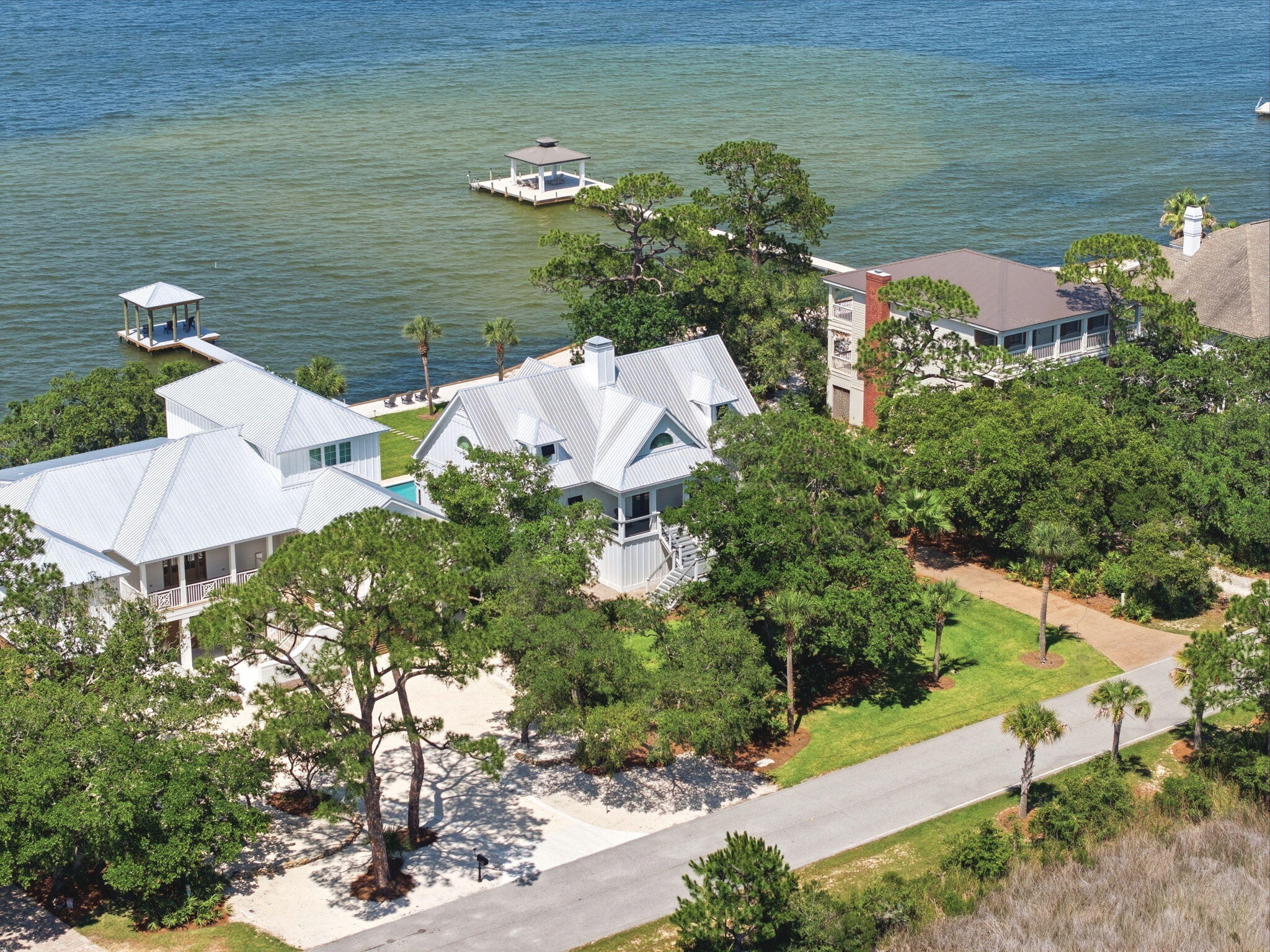 31061 Peninsula Drive Orange Beach, AL 36561 - Photo 84 of 93 a view of a lake with a building in front of it