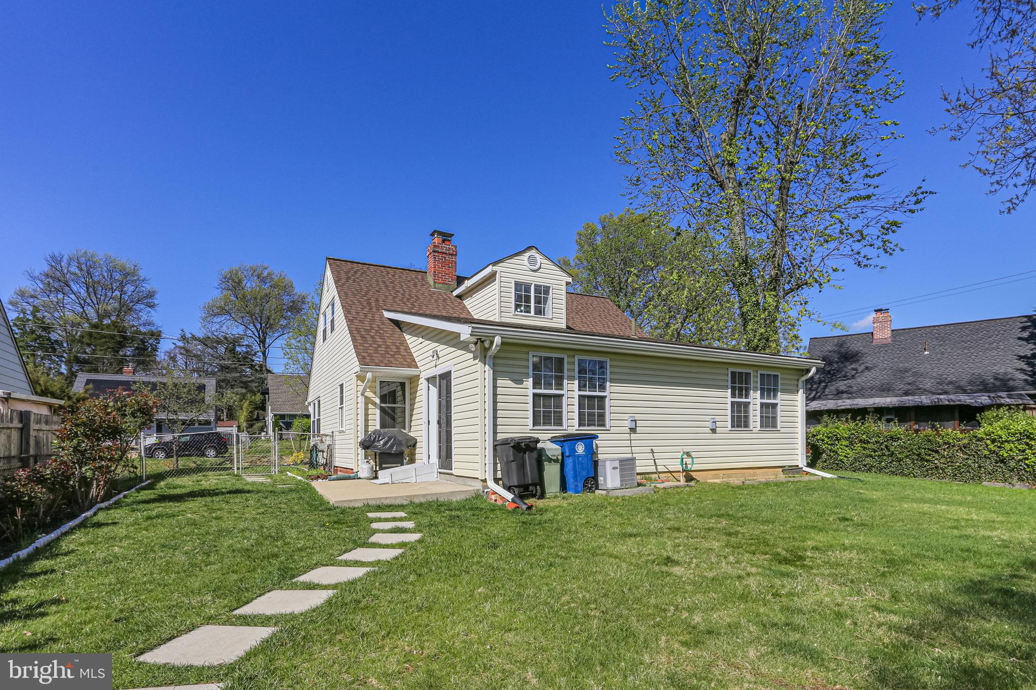 9939 Cottrell Terrace Silver Spring, MD 20903 - Photo 24 of 33 a view of a house with backyard
