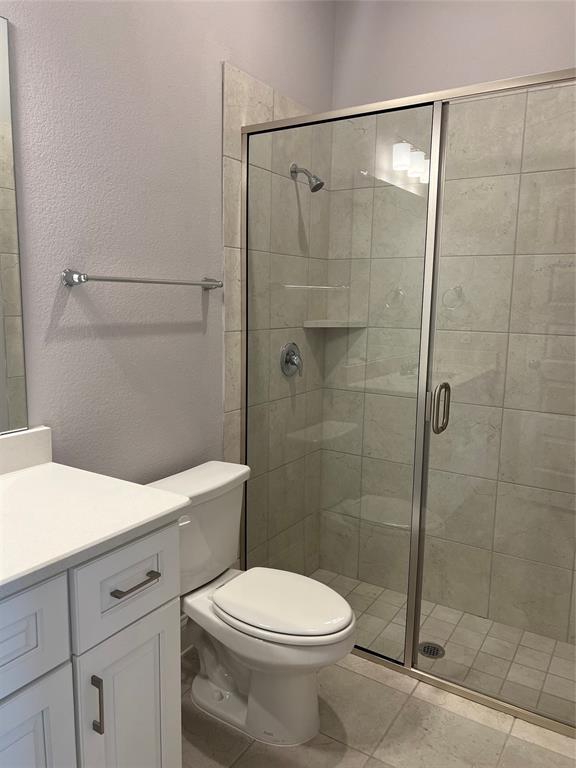 3610 Pacific Way Sachse, TX 75048 - Photo 10 of 23 a bathroom with a shower a toilet and a sink
