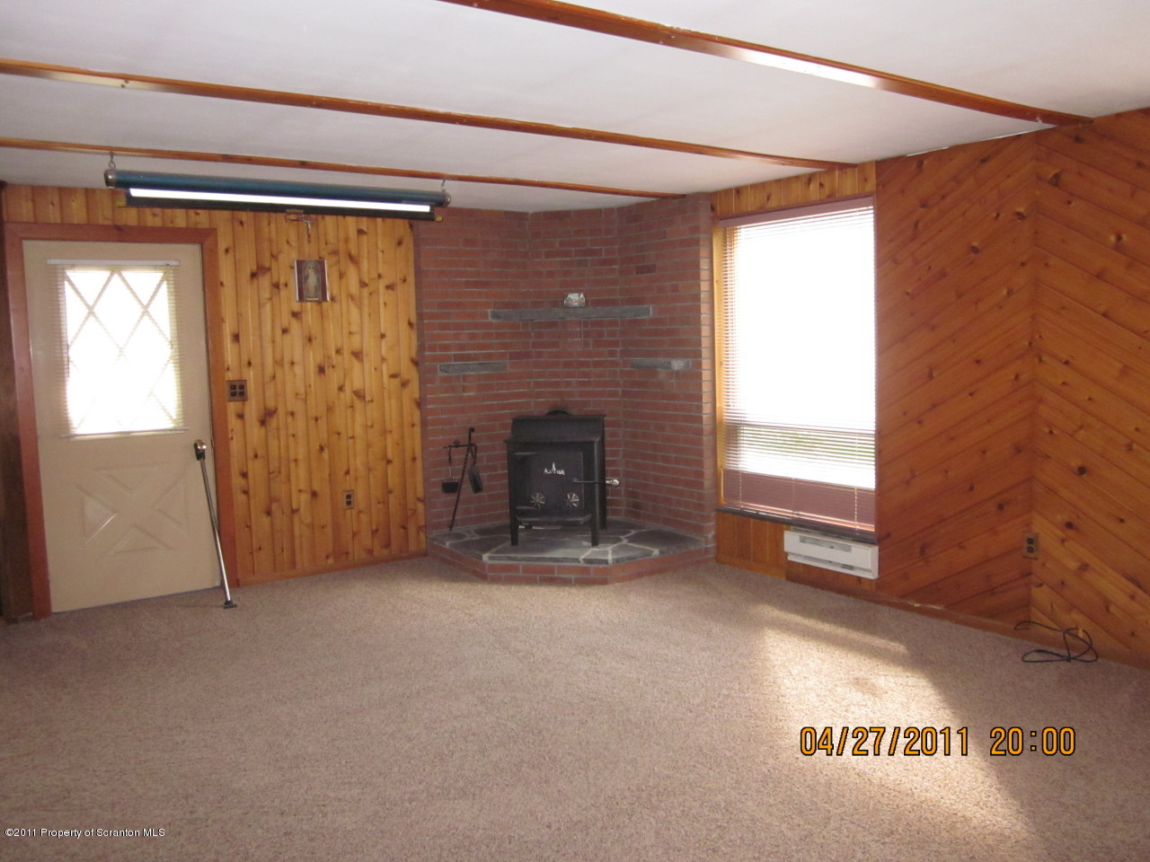 104 Butternut Lane Hawley, PA 18428 - Photo 5 of 8 Family with woodstove