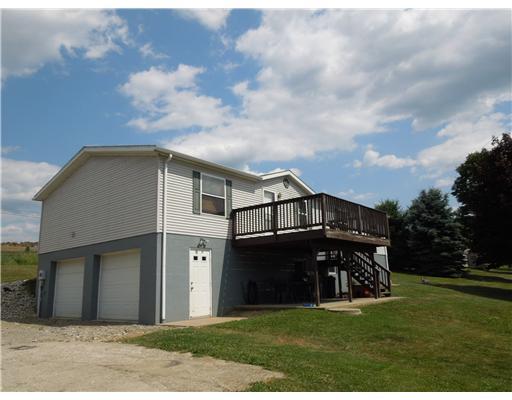 201 Neiderhiser Road Mount Pleasant, PA 15666 - Photo 4 of 18 Exterior Back. Rear View of the Deck and lower Patio.