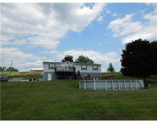 201 Neiderhiser Road Mount Pleasant, PA 15666 - Photo 5 of 18 Exterior Back. View of the Back of the home and Pool.