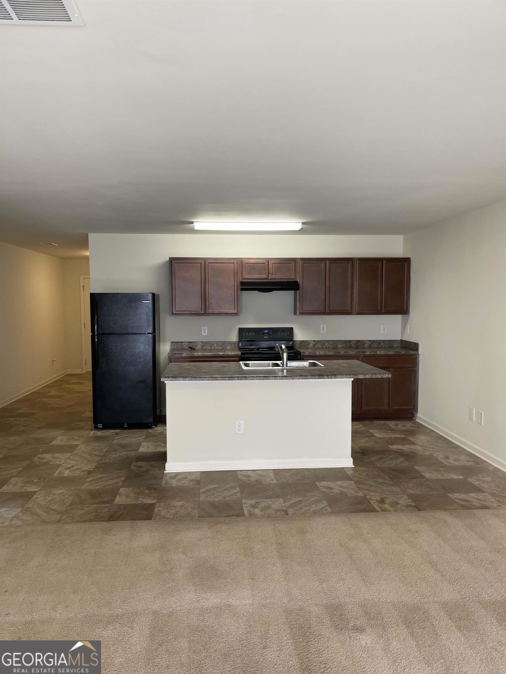 408 Erin Court Villa Rica, GA 30180 - Photo 3 of 16 a view of kitchen with kitchen island