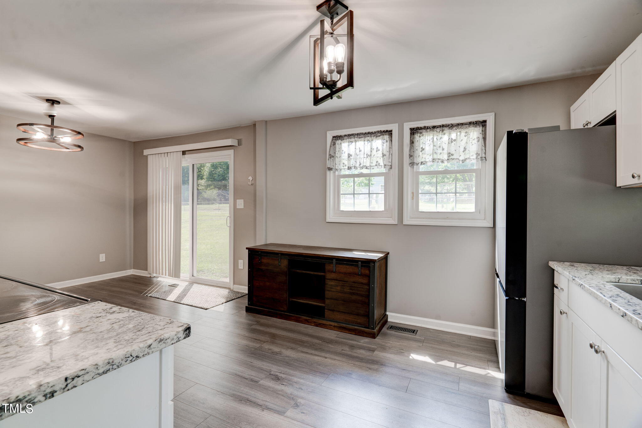 3408 High Gate Road Raleigh, NC 27603 - Photo 22 of 49 a view of an empty room with a window and fireplace