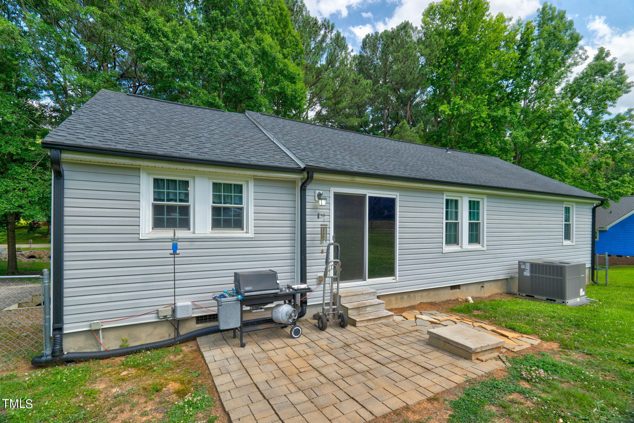 3408 High Gate Road Raleigh, NC 27603 - Photo 36 of 49 a backyard of a house with seating space