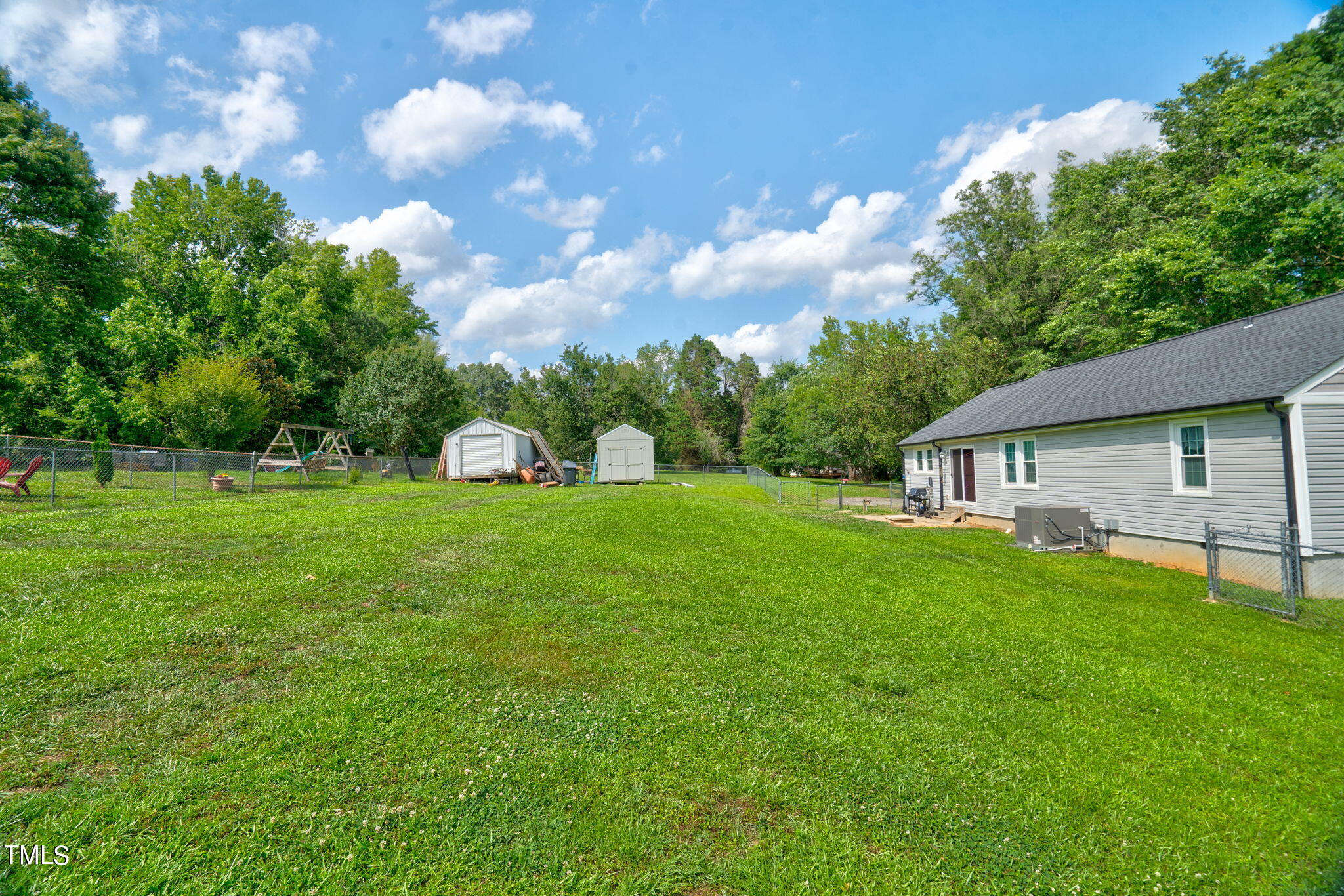 3408 High Gate Road Raleigh, NC 27603 - Photo 38 of 49 a house view with a garden space