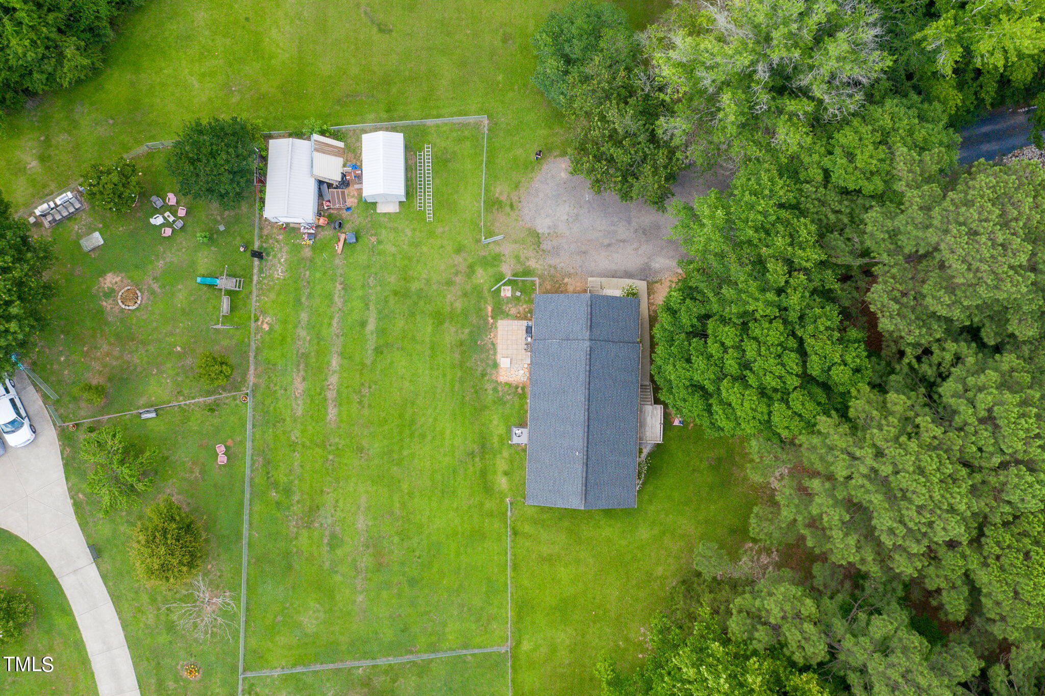 3408 High Gate Road Raleigh, NC 27603 - Photo 47 of 49 an aerial view of residential house with outdoor space and trees all around