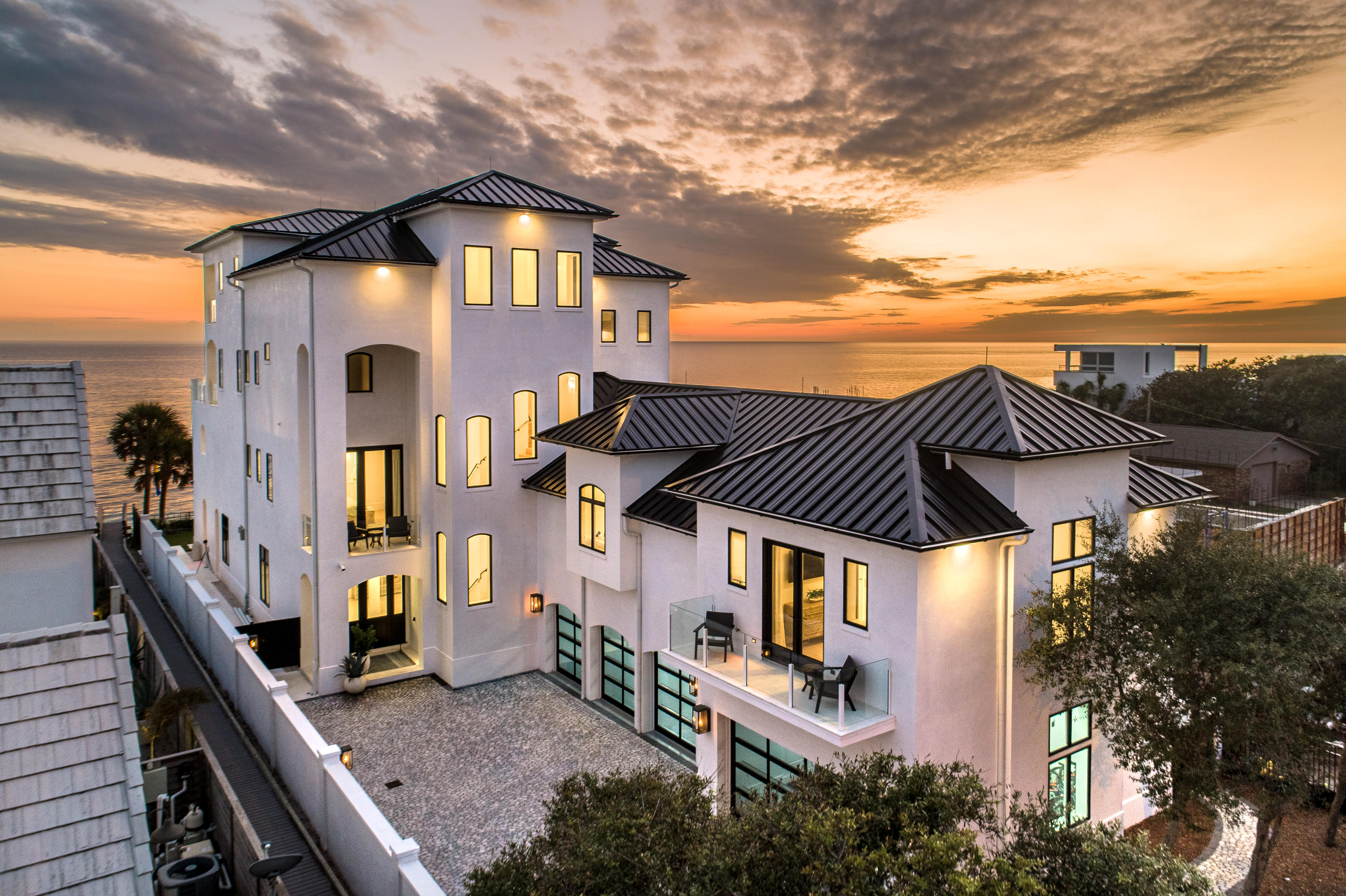 3010 East County Highway 30A Santa Rosa Beach, FL 32459 - Photo 2 of 54 a front view of a house with a yard
