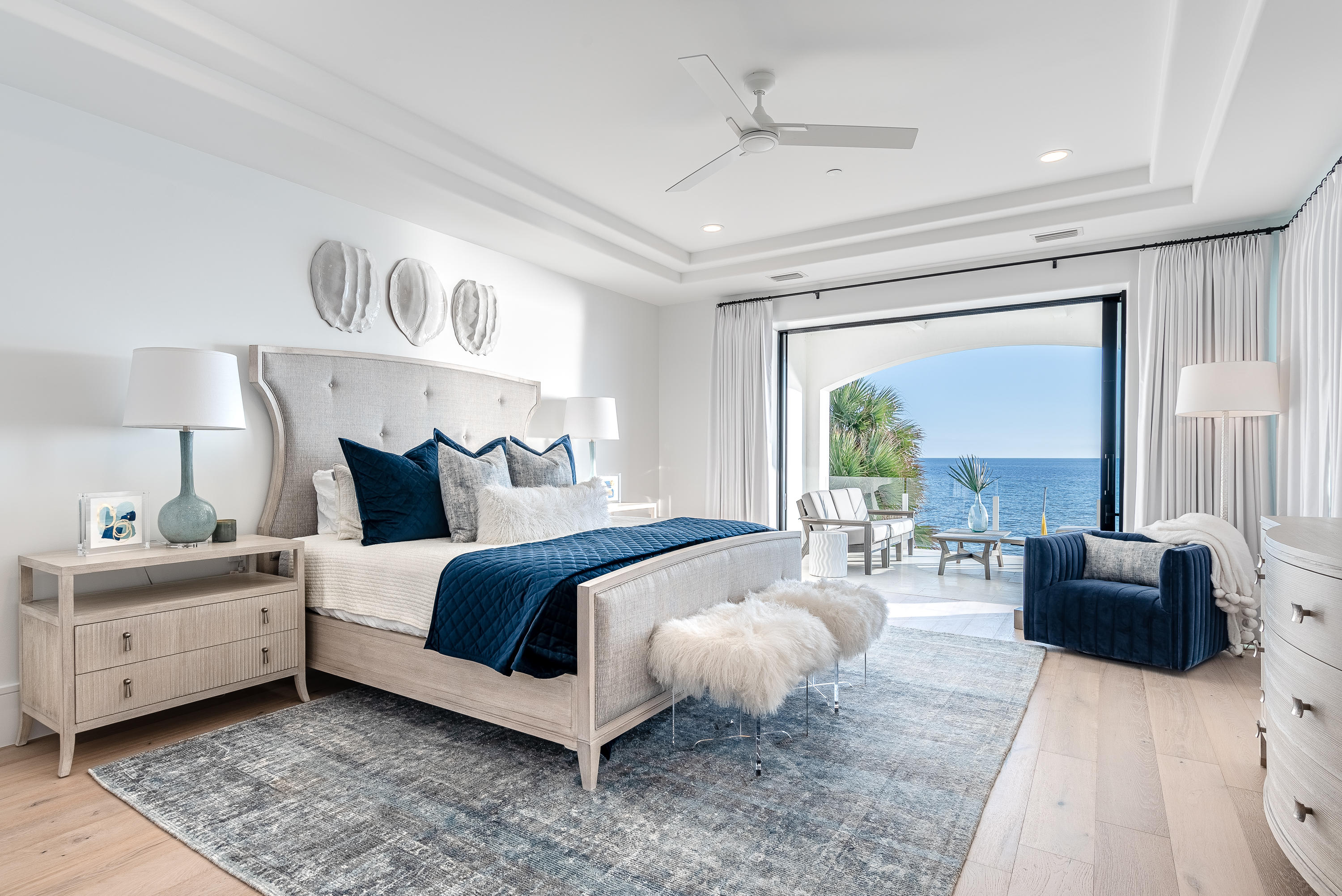 3010 East County Highway 30A Santa Rosa Beach, FL 32459 - Photo 29 of 54 a spacious bedroom with a bed and a couch