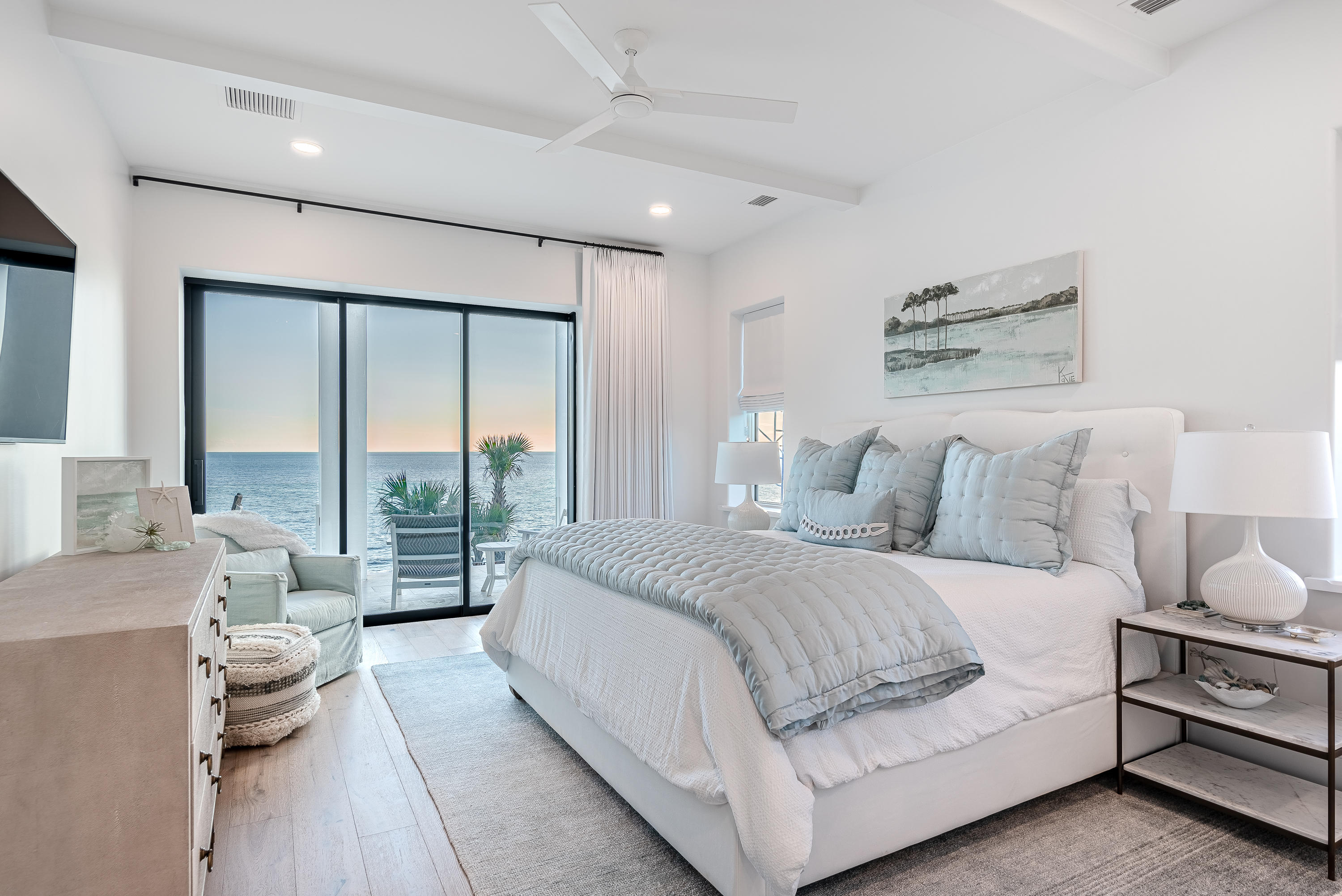3010 East County Highway 30A Santa Rosa Beach, FL 32459 - Photo 33 of 54 a spacious bedroom with a large bed and a large window