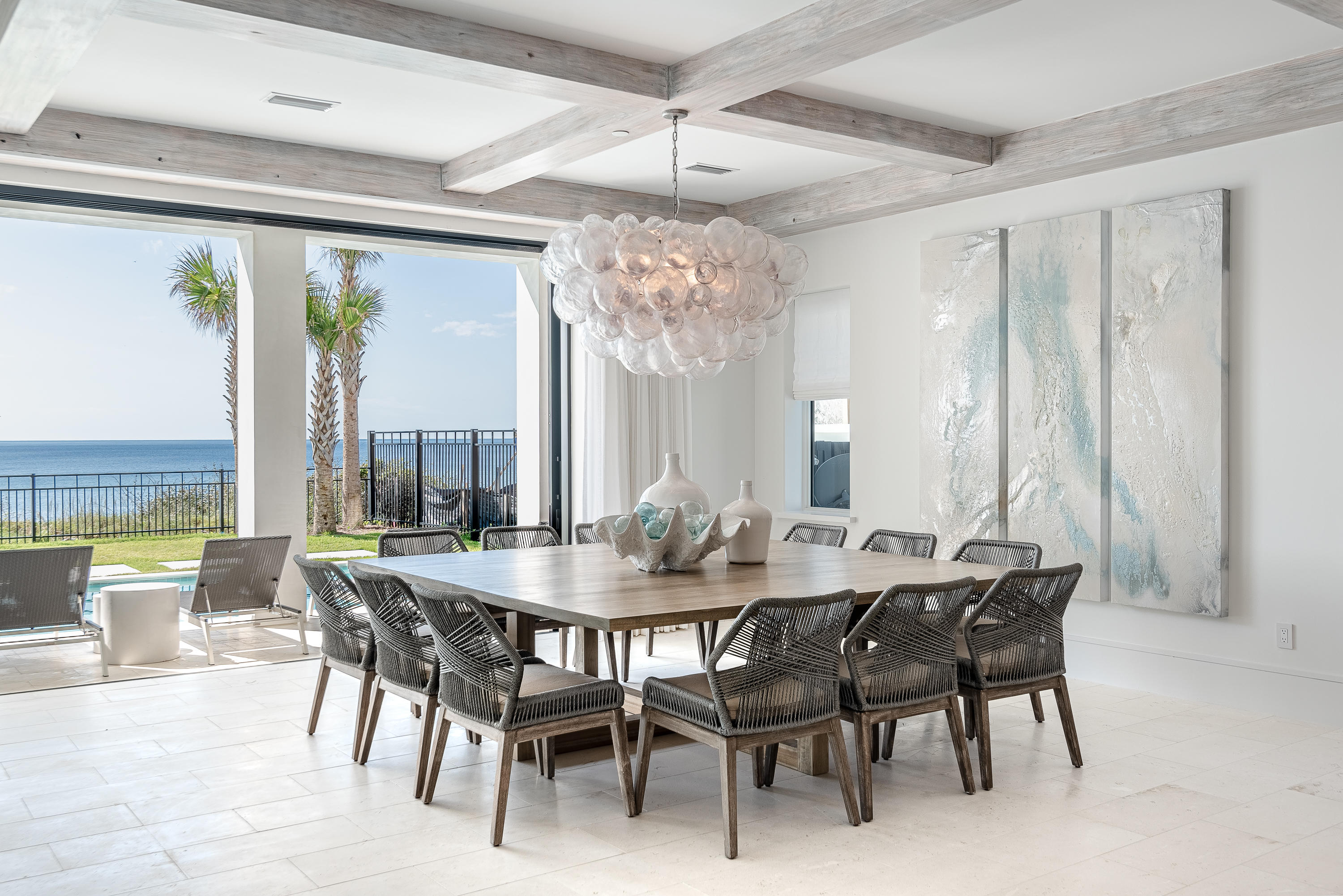 3010 East County Highway 30A Santa Rosa Beach, FL 32459 - Photo 6 of 54 a dining room with furniture window and outside view