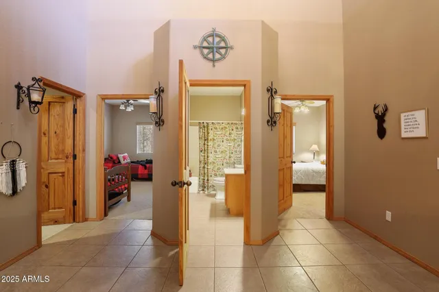 a view of a hallway with bathroom