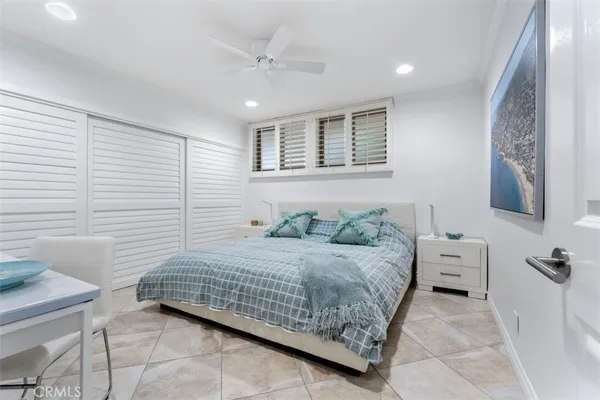 a bedroom with a bed and furniture