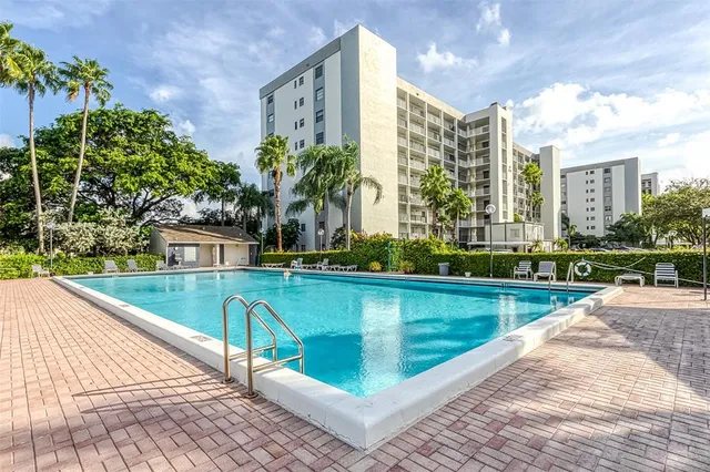 a view of swimming pool from a balcony