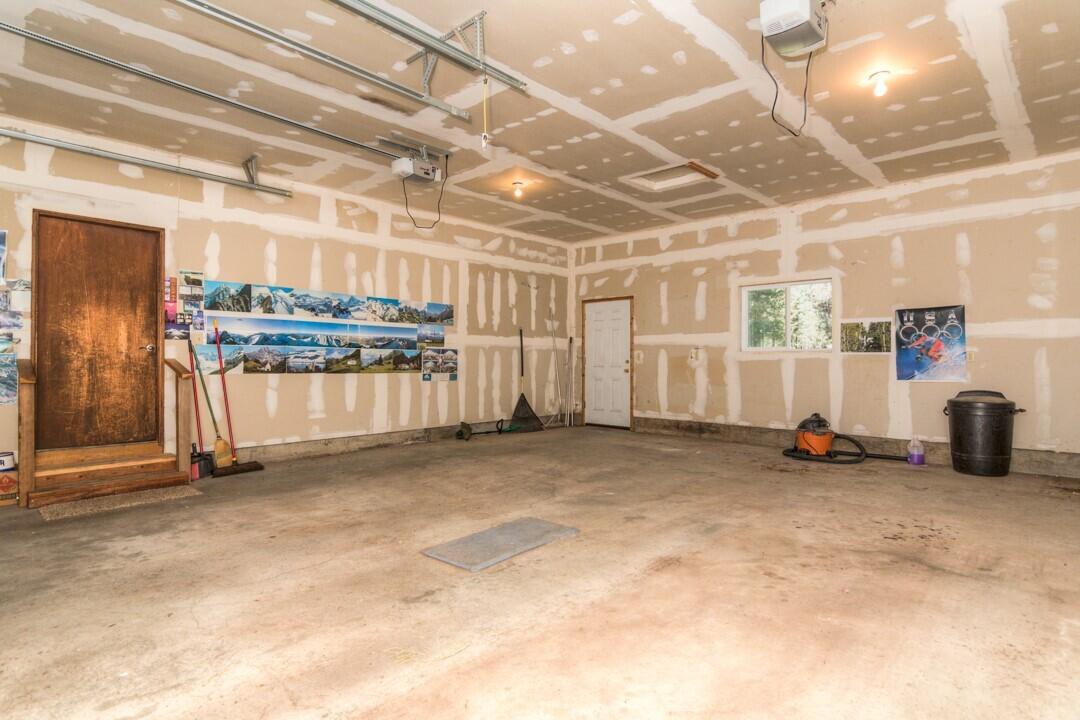 17026 Torrance Road Bend, OR 97707 - Photo 22 of 27 a view of a room with gym equipment