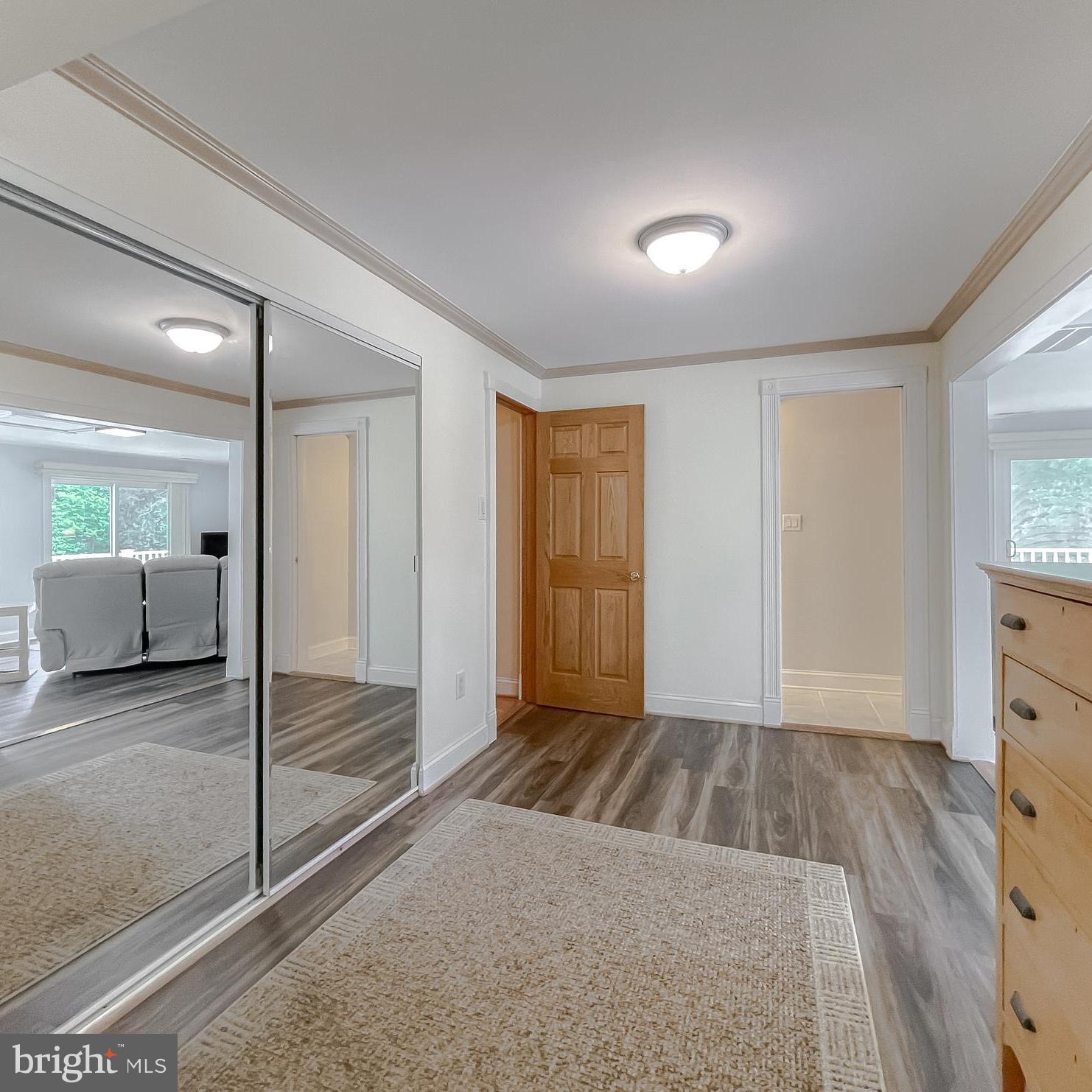 239 Frontier Trail Lusby, MD 20657 - Photo 17 of 73 Double closet w/dressing area & entrance to bath