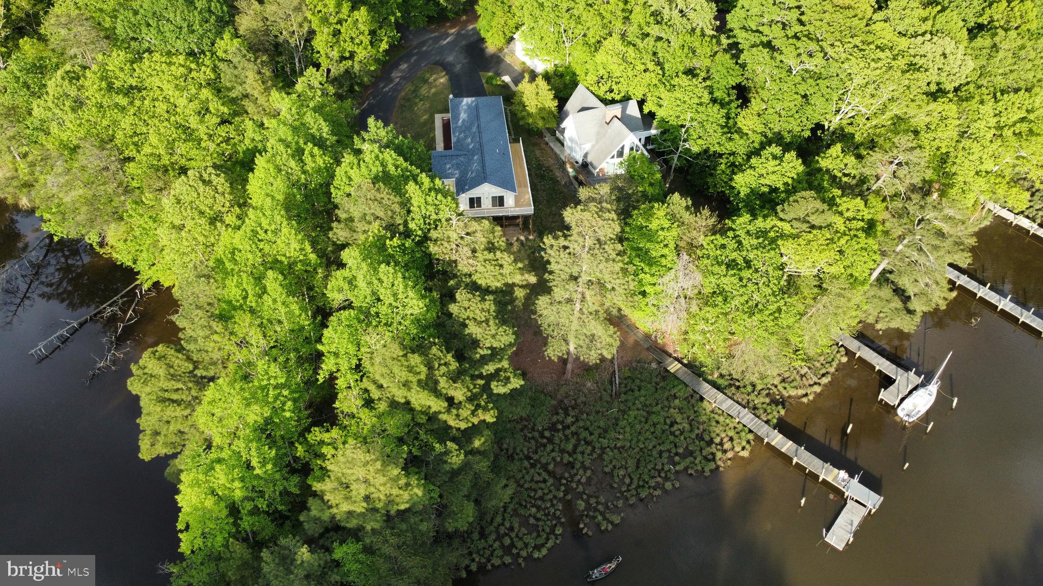 239 Frontier Trail Lusby, MD 20657 - Photo 2 of 73 Aerial view of home, pier & additional lot