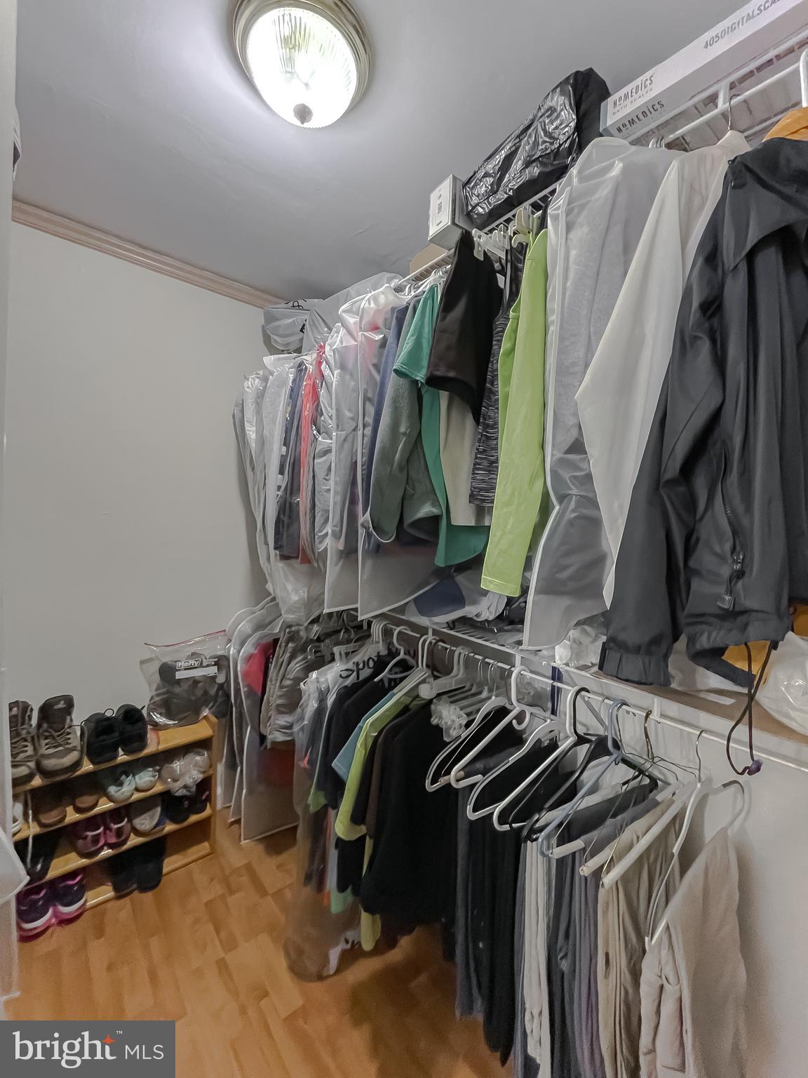 239 Frontier Trail Lusby, MD 20657 - Photo 19 of 73 Walk-in closet doubles primary's closet space