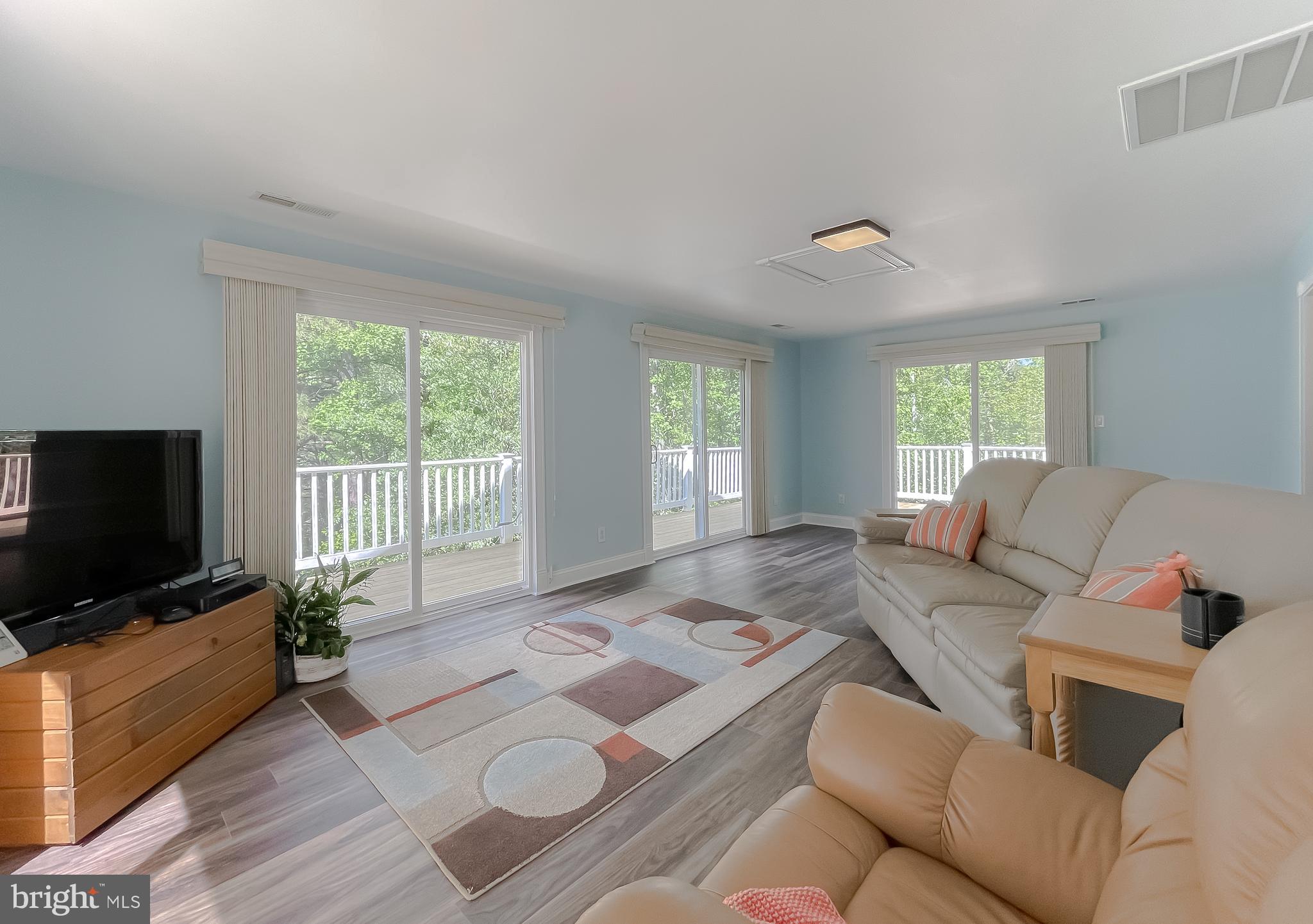 239 Frontier Trail Lusby, MD 20657 - Photo 25 of 73 Views of Mill Creek from sunroom