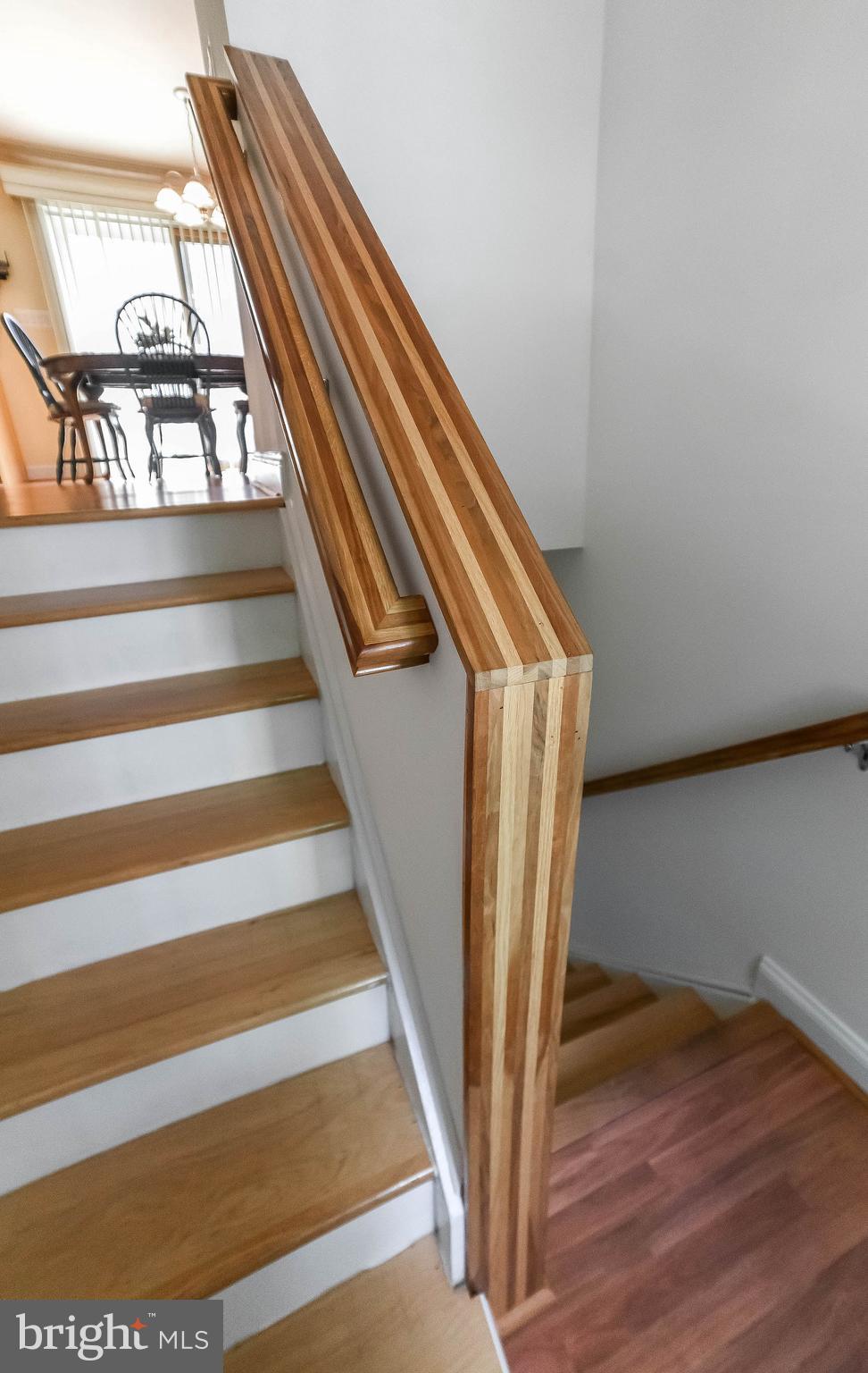 239 Frontier Trail Lusby, MD 20657 - Photo 34 of 73 Handmade wood railings to ground level