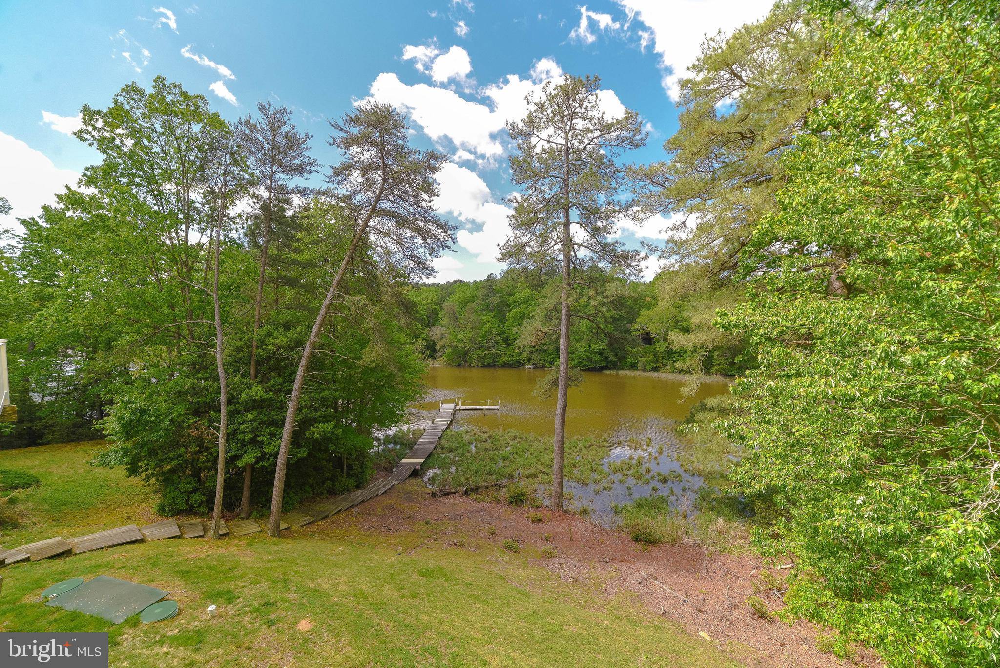 239 Frontier Trail Lusby, MD 20657 - Photo 45 of 73 Back yard with steps down to private pier