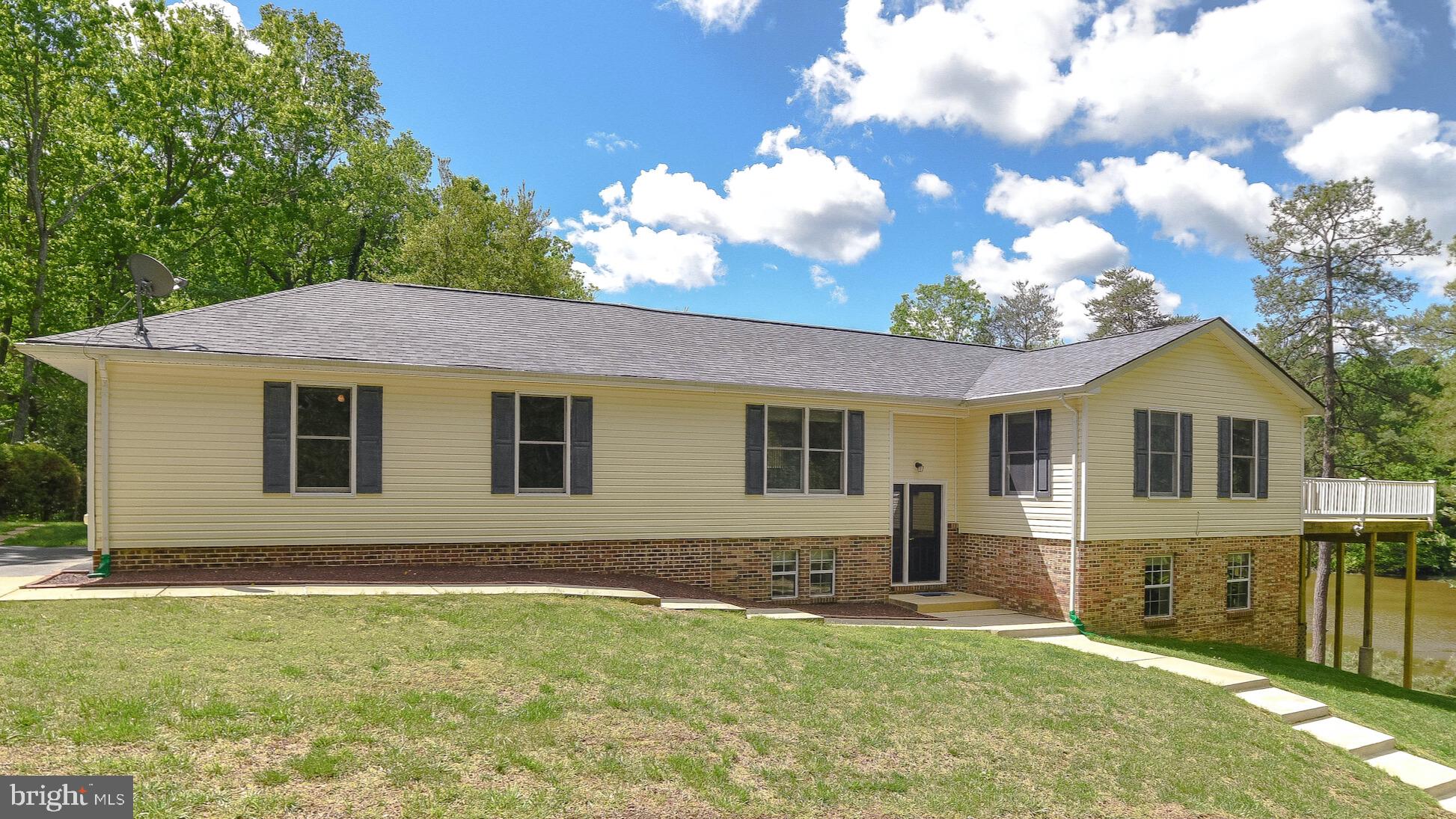 239 Frontier Trail Lusby, MD 20657 - Photo 51 of 73 New roof, gutter guards and exterior lights