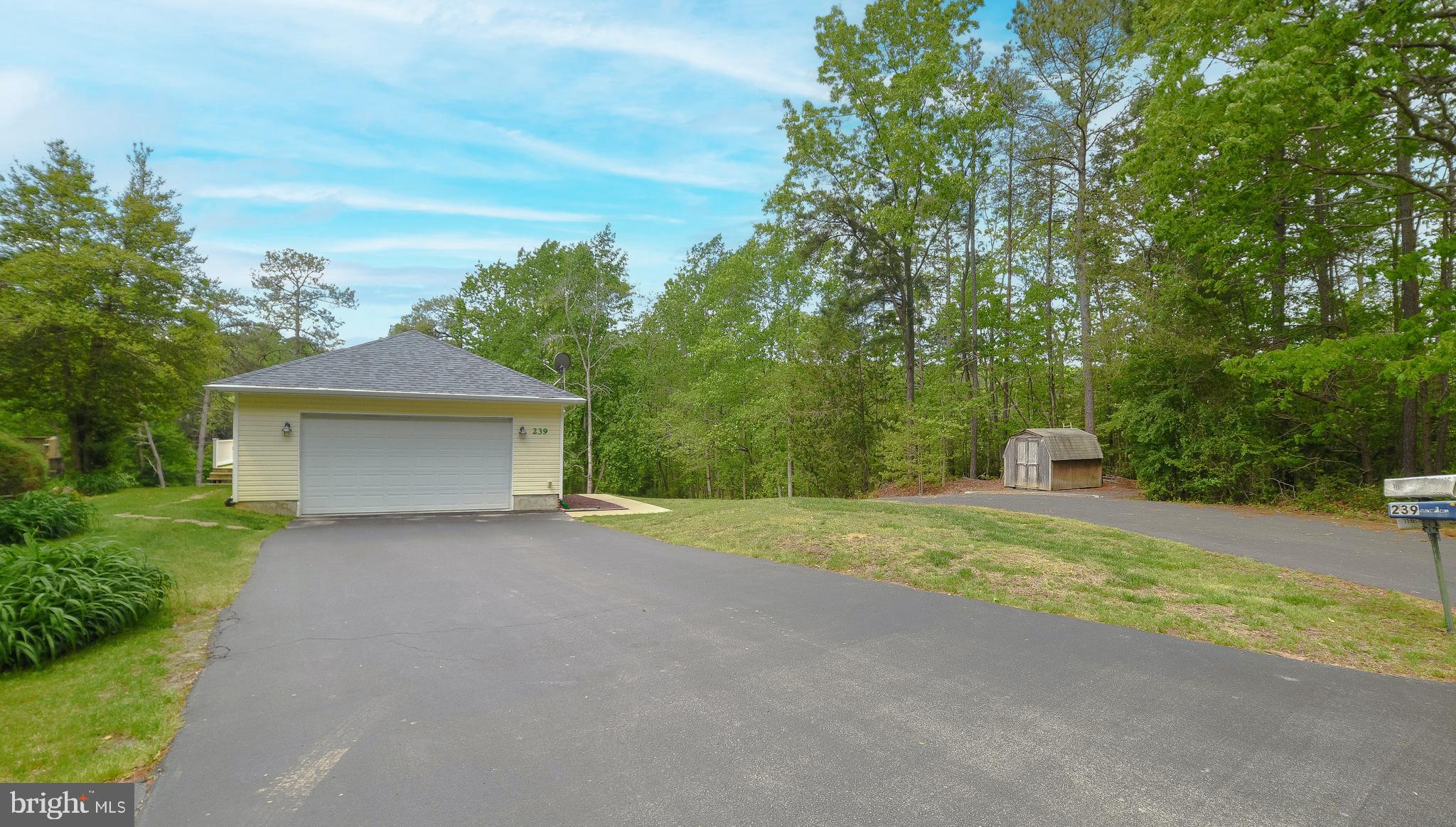 239 Frontier Trail Lusby, MD 20657 - Photo 55 of 73 Paved driveway with room for 6 vehicles