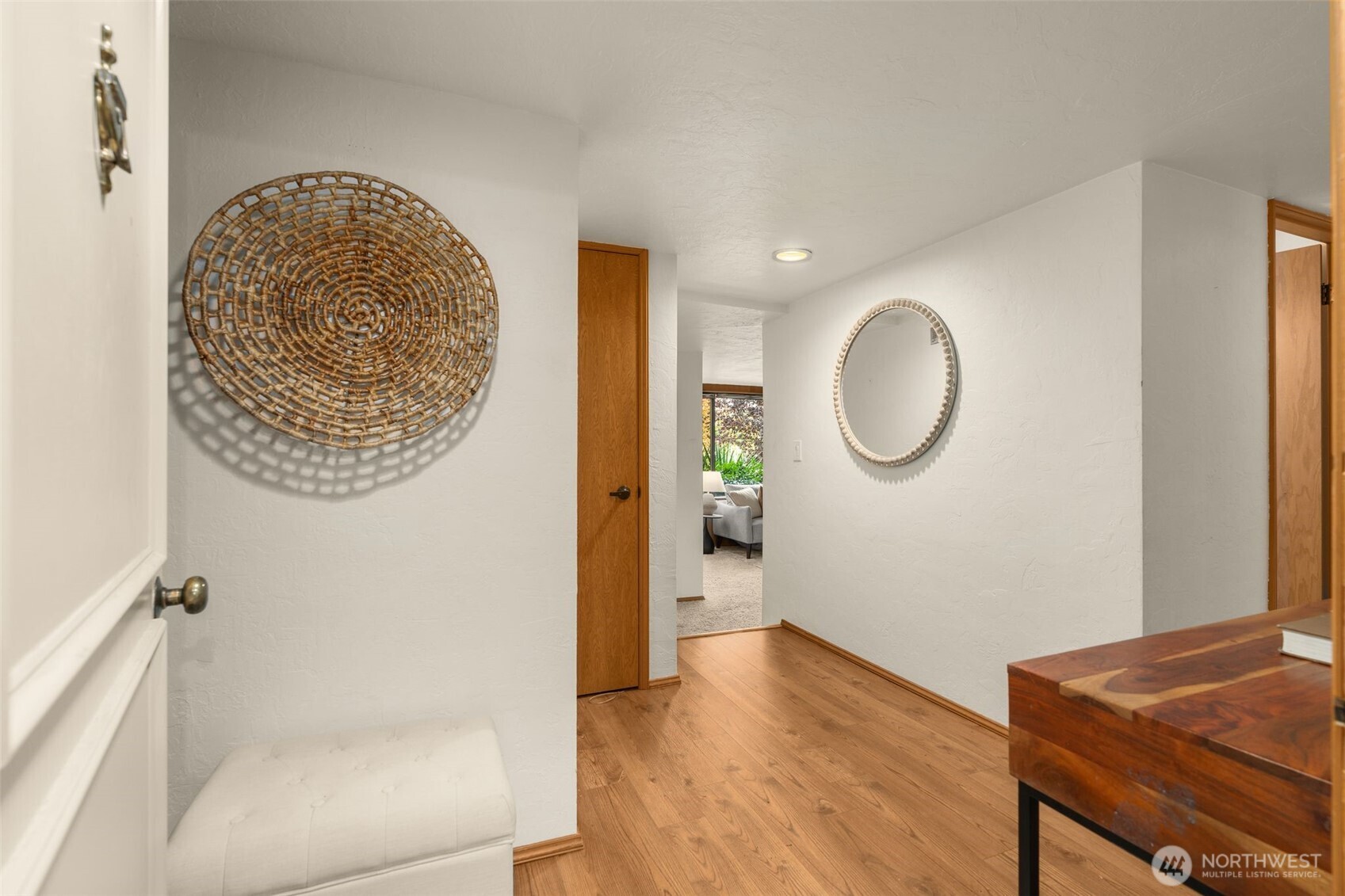 1627 California Avenue Southwest, Unit 1 Seattle, WA 98116 - Photo 3 of 24 a view of a room with wooden floor and glass windows