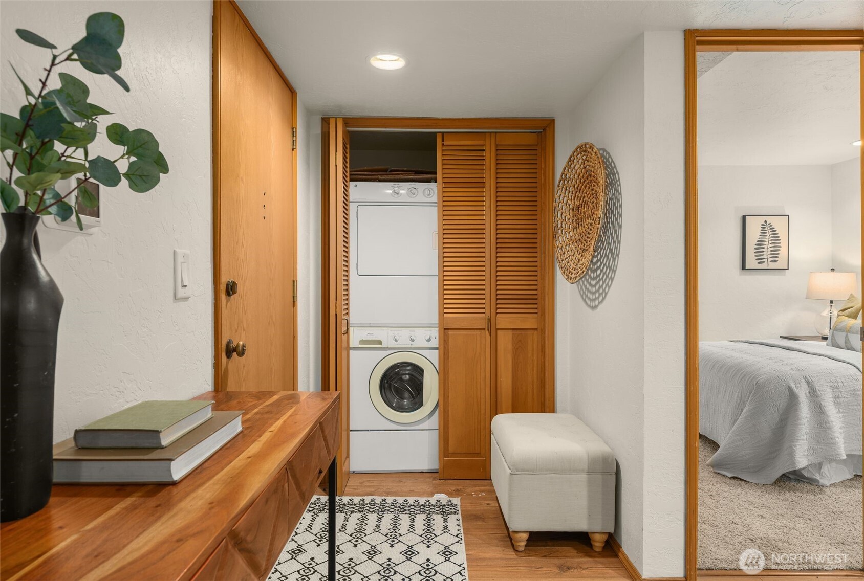 1627 California Avenue Southwest, Unit 1 Seattle, WA 98116 - Photo 4 of 24 a bedroom with a bed and a window