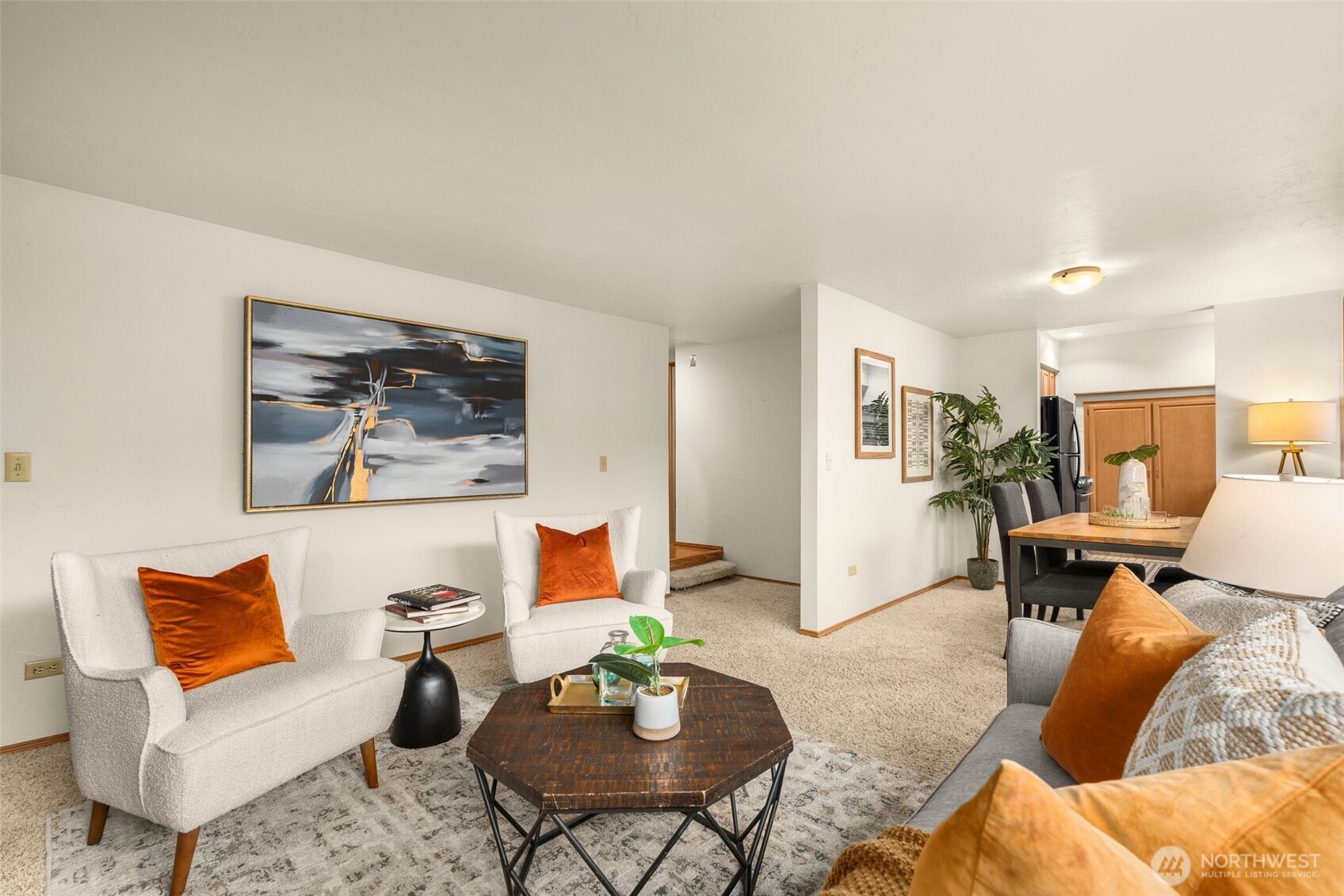 1627 California Avenue Southwest, Unit 1 Seattle, WA 98116 - Photo 7 of 24 a living room with furniture and wooden floor