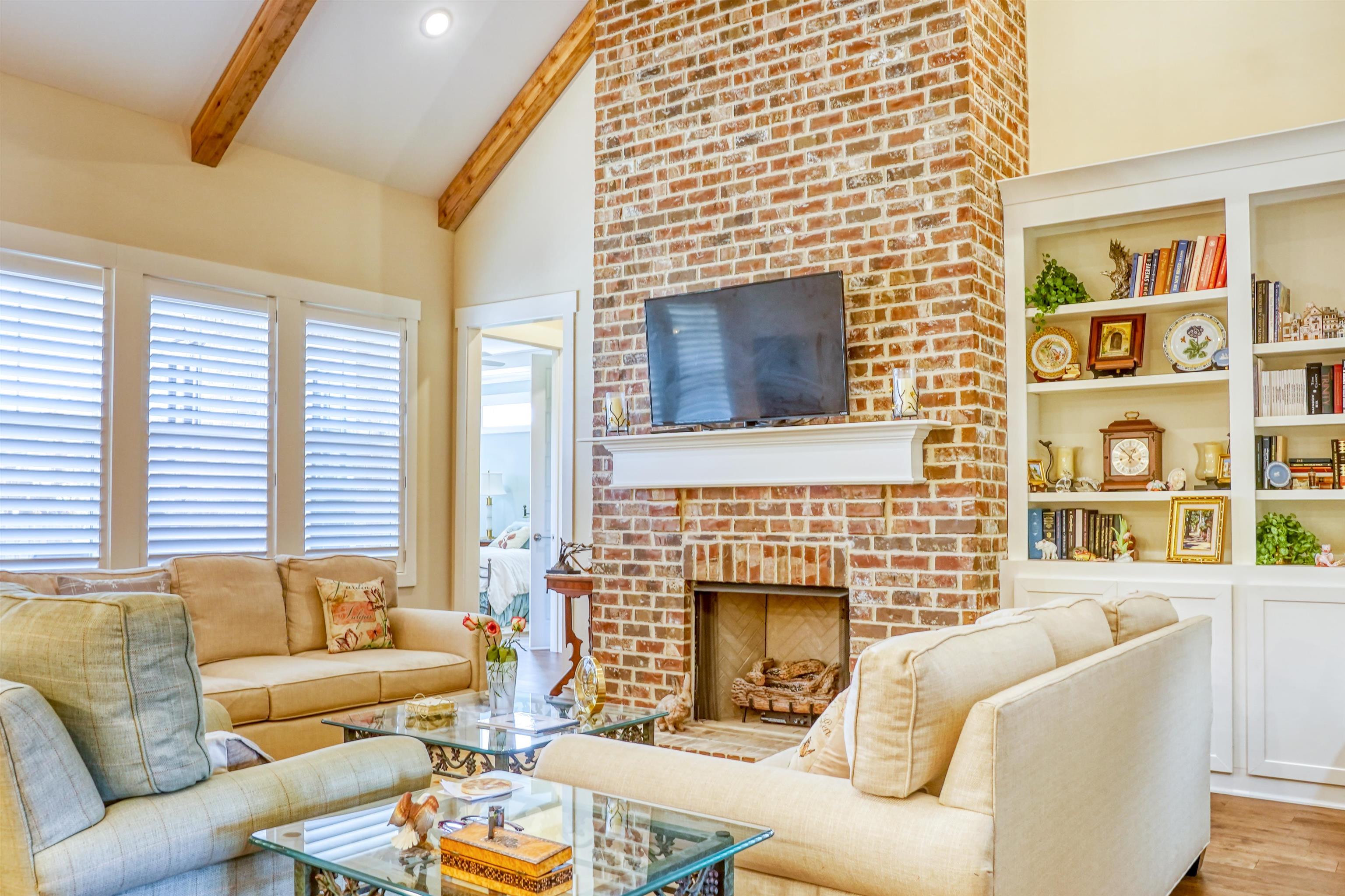 3538 Rokeby Farm Lane Collierville, TN 38017 - Photo 12 of 24 a living room with furniture windows and a fireplace