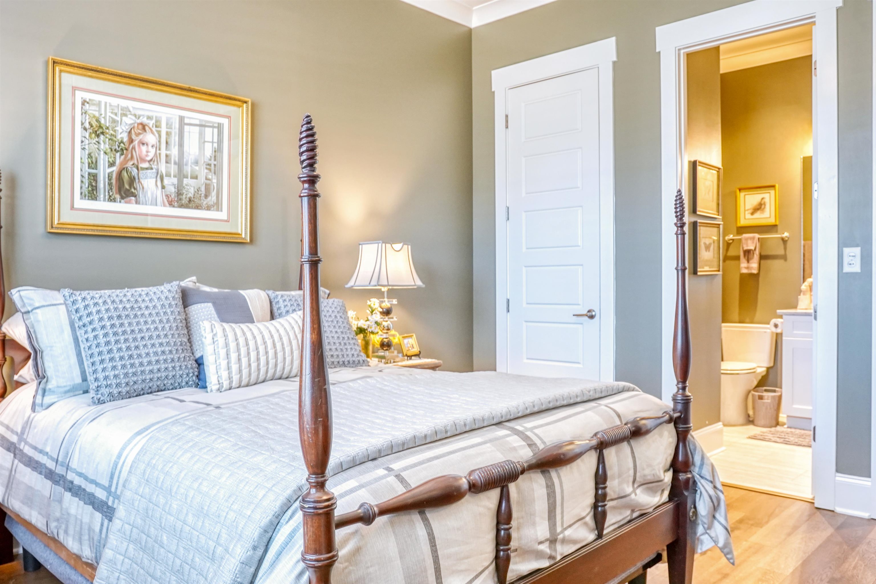 3538 Rokeby Farm Lane Collierville, TN 38017 - Photo 5 of 24 a bedroom with a bed and wooden floor
