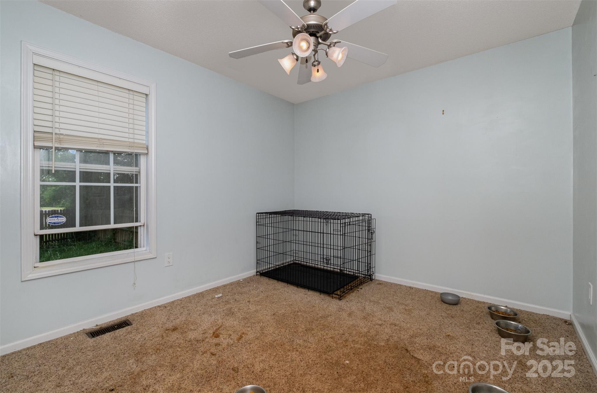 159 Pitts School Road Northwest Concord, NC 28027 - Photo 18 of 31 a view of an empty room with a window