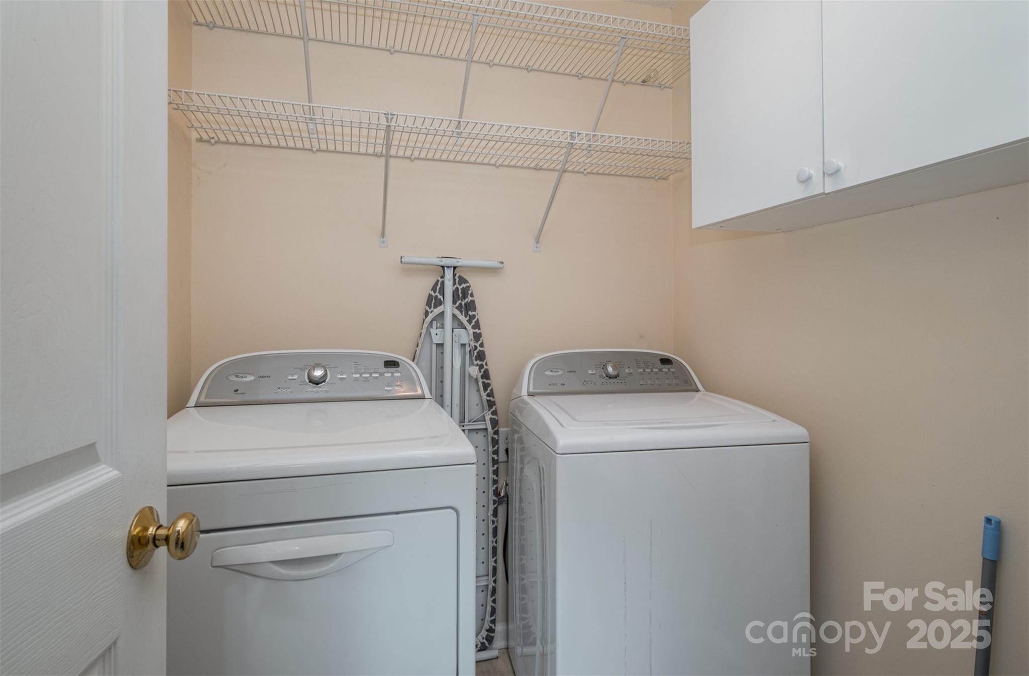 159 Pitts School Road Northwest Concord, NC 28027 - Photo 20 of 31 a utility room with dryer and washer
