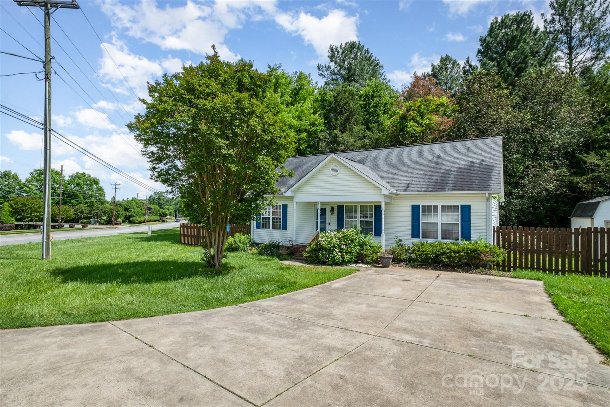 159 Pitts School Road Northwest Concord, NC 28027 - Photo 30 of 31 a front view of a house with a yard