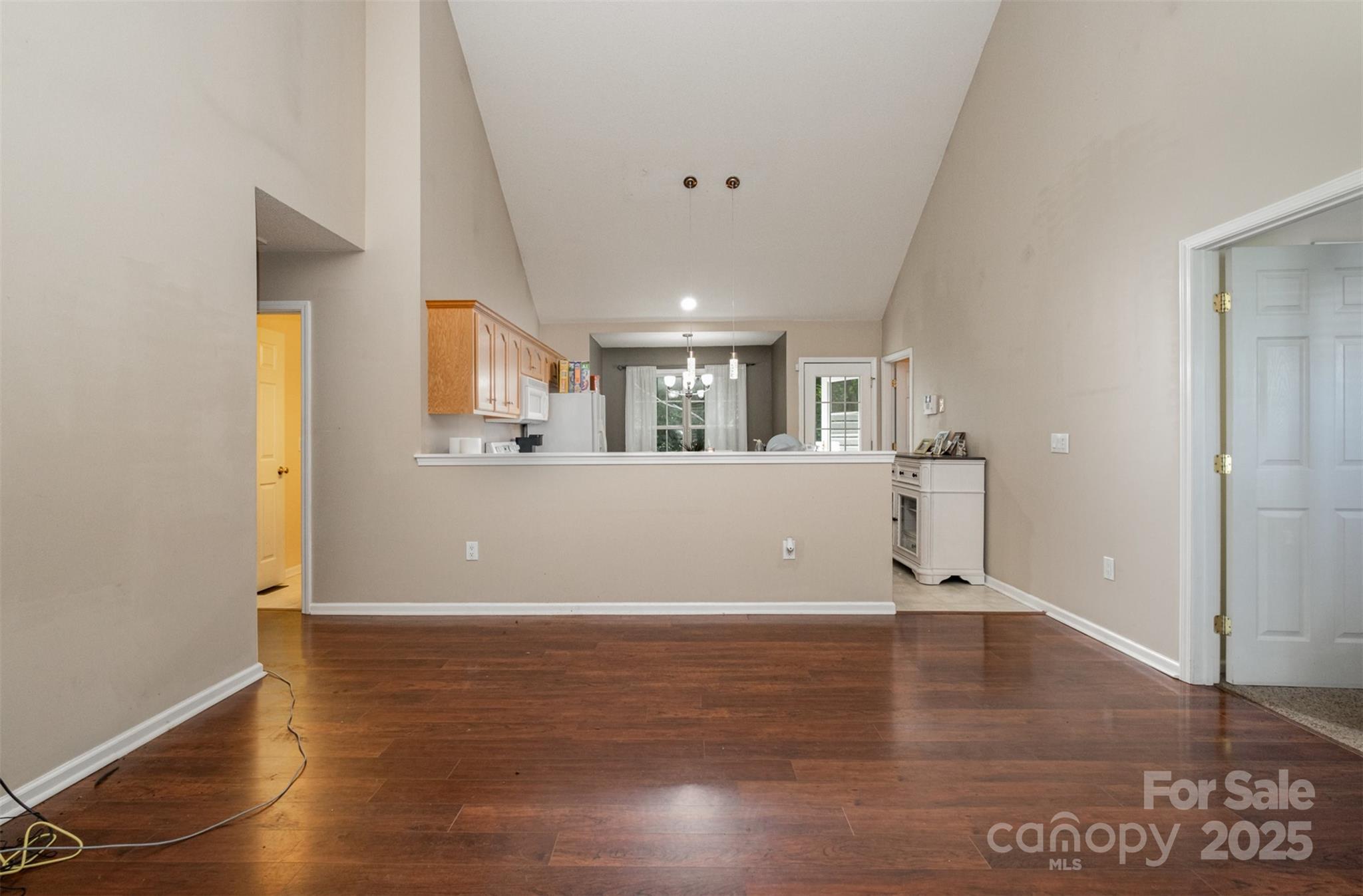 159 Pitts School Road Northwest Concord, NC 28027 - Photo 5 of 31 a view of a room with wooden floor and a window